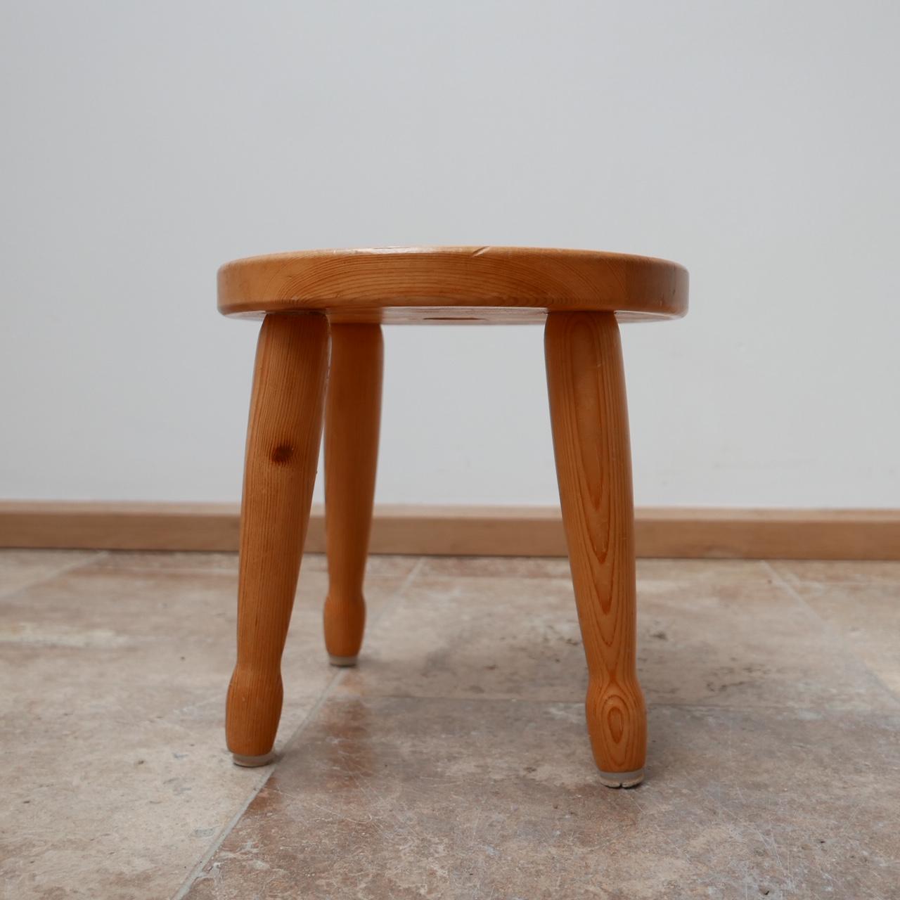 A midcentury stool or side table.

Pine, Sweden, circa 1960s.

Four legs, simple construction.

Dimensions: 30 diameter x 30 height in cm.
 