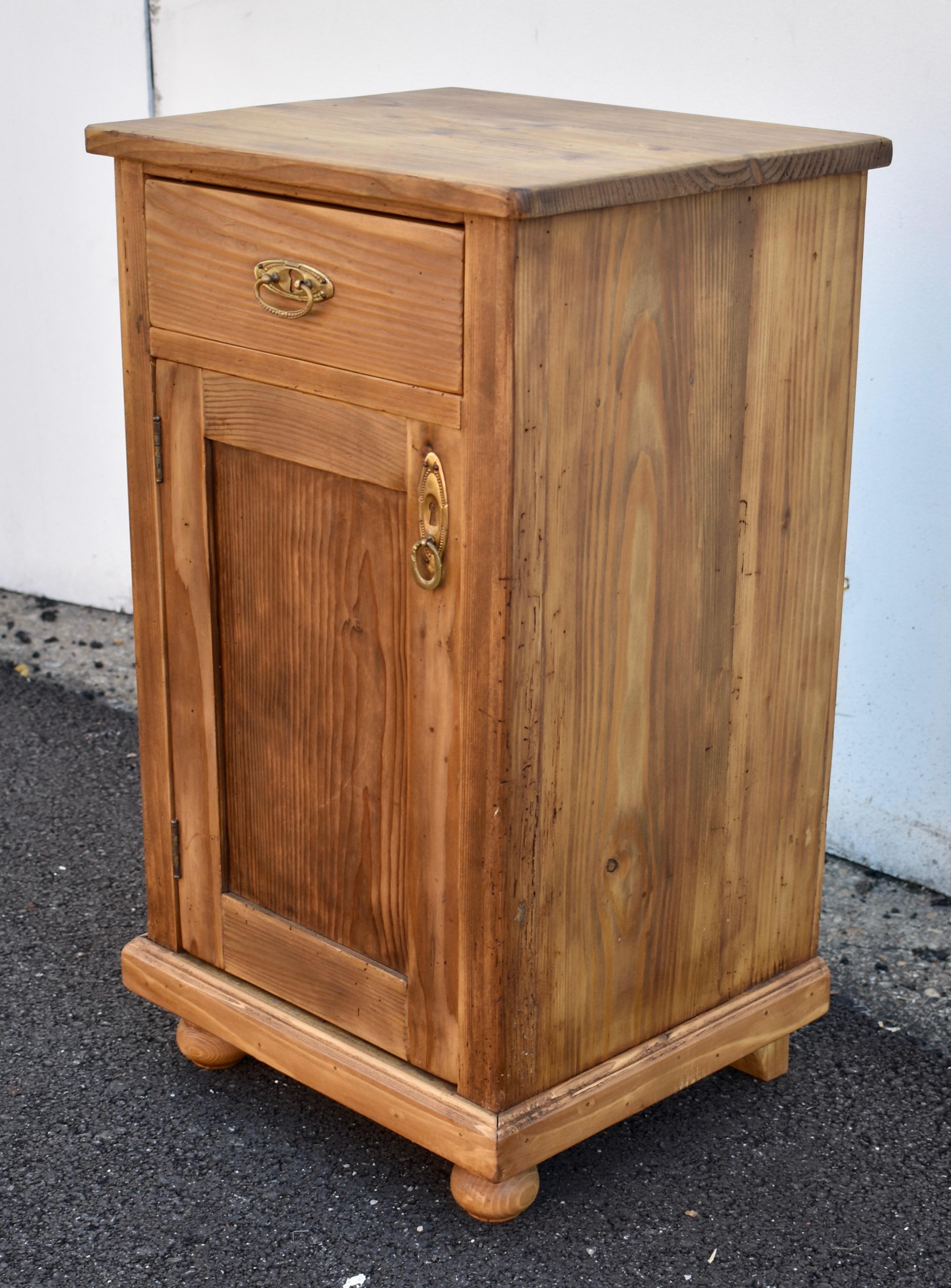 Polished Pine Nightstand with One Door and One Drawer