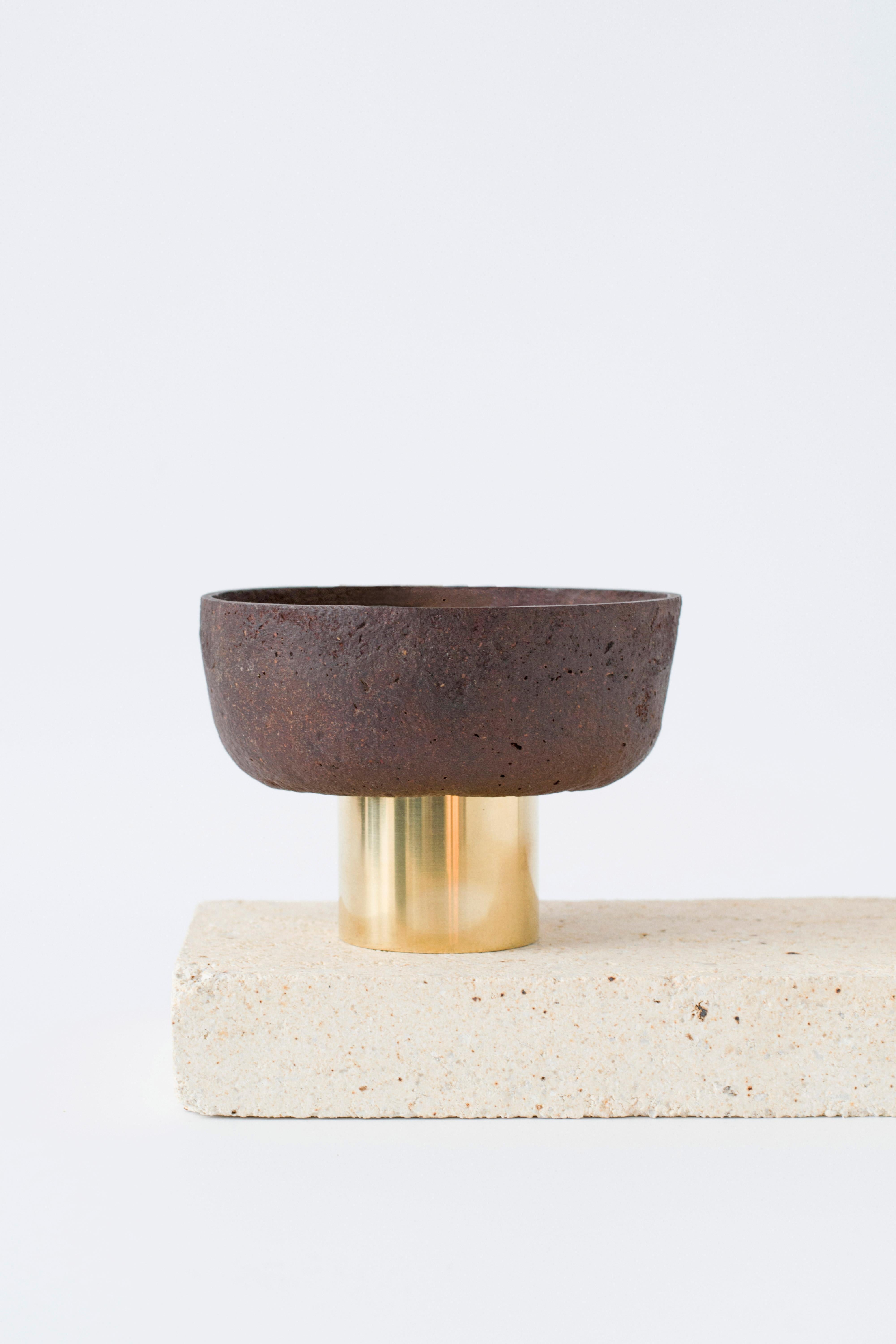 Pine pedestal bowl by Evelina Kudabaite Studio
Handmade
Materials: pine, brass
Dimensions: H 7.5 mm x D 12 mm
Colour: reddish
Notes: for dry use

Since 2015, product designer Evelina Kudabaite keeps on developing and making GIRIA objects. Designer