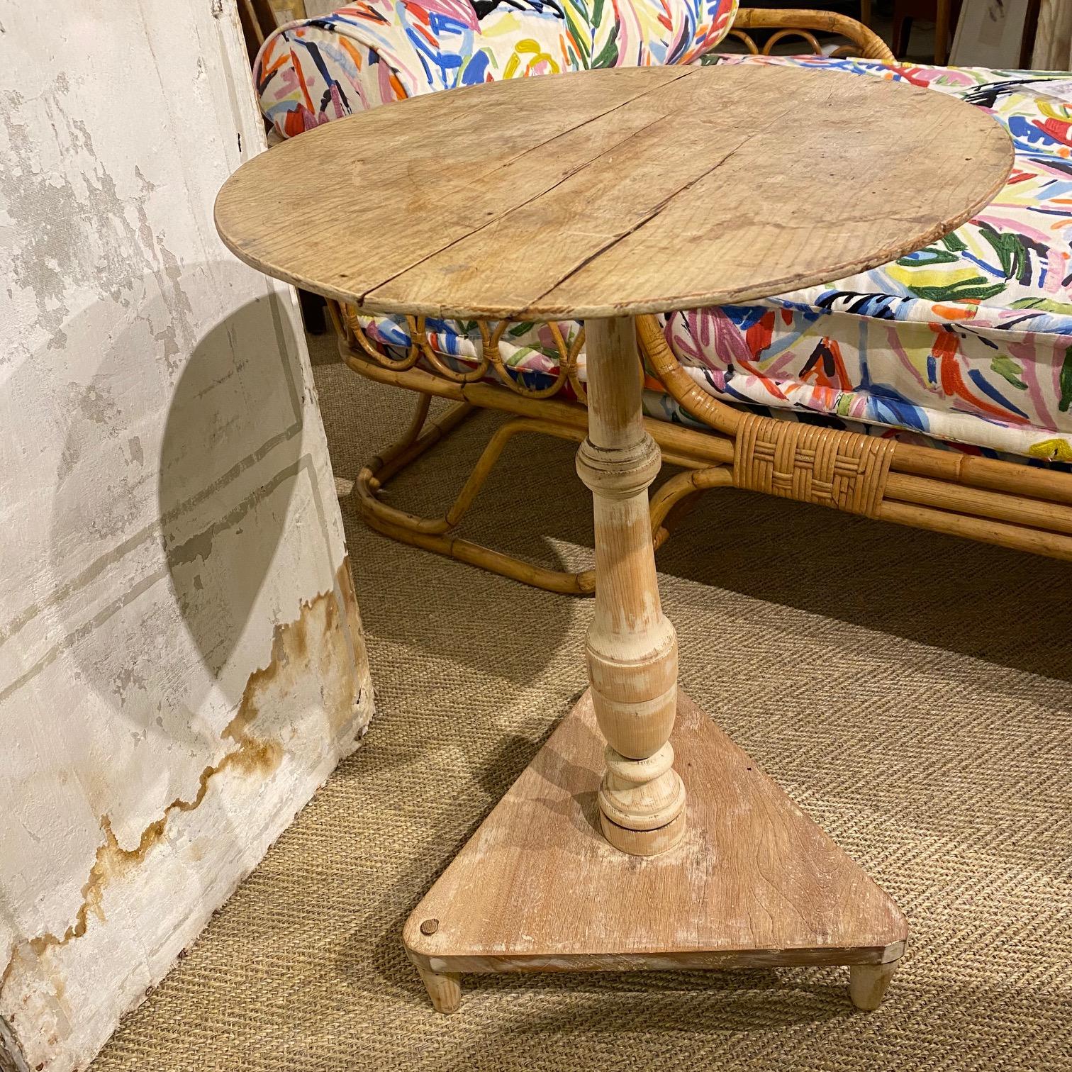 Pine pedestal candle table, late 18th-early 19th century, American.
Measures: 18