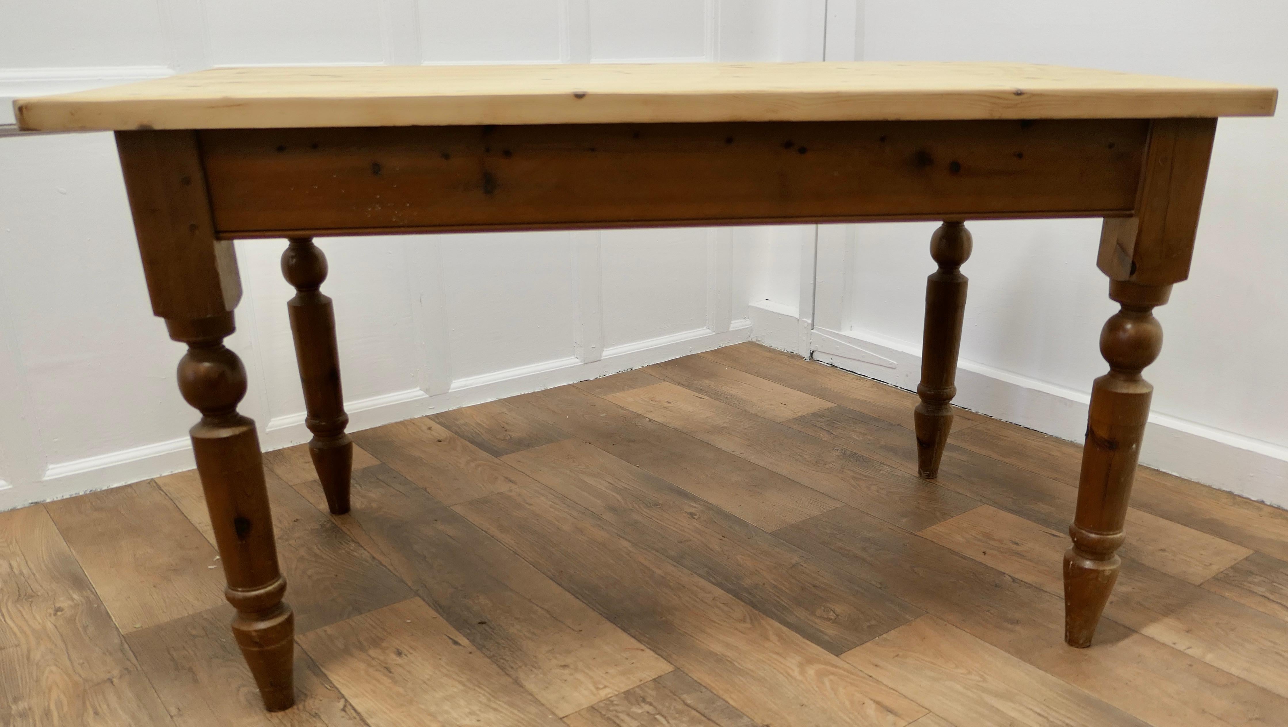 Pine Scrub Top Farmhouse Kitchen Table

 This good Traditional table has a cleaned up plank scrub top, this has been left in its bleached finish. The turned legs are age darkened and have a lovely natural colour
This is a good size table for a