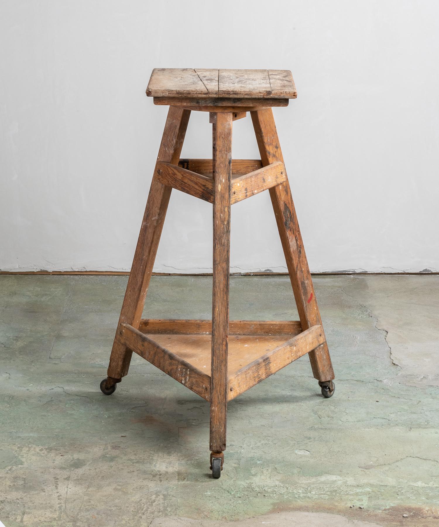 Pine sculpture stand, America, circa 1890.

Includes adjustable top, two shelves and casters. From Rhode Island.