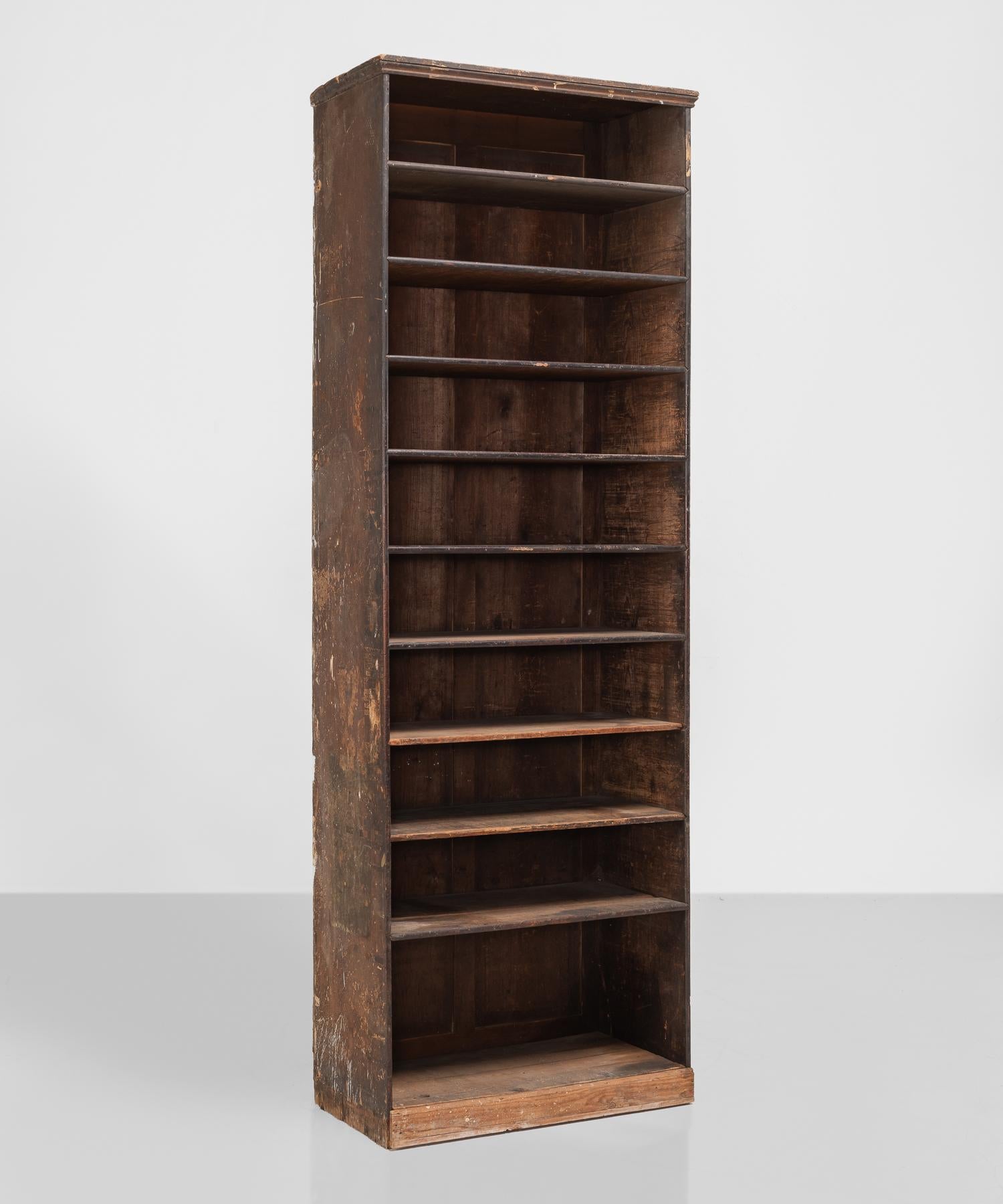 Pine shop shelving unit, circa 1900.

Panelled back with original ebonised shelf fronts.