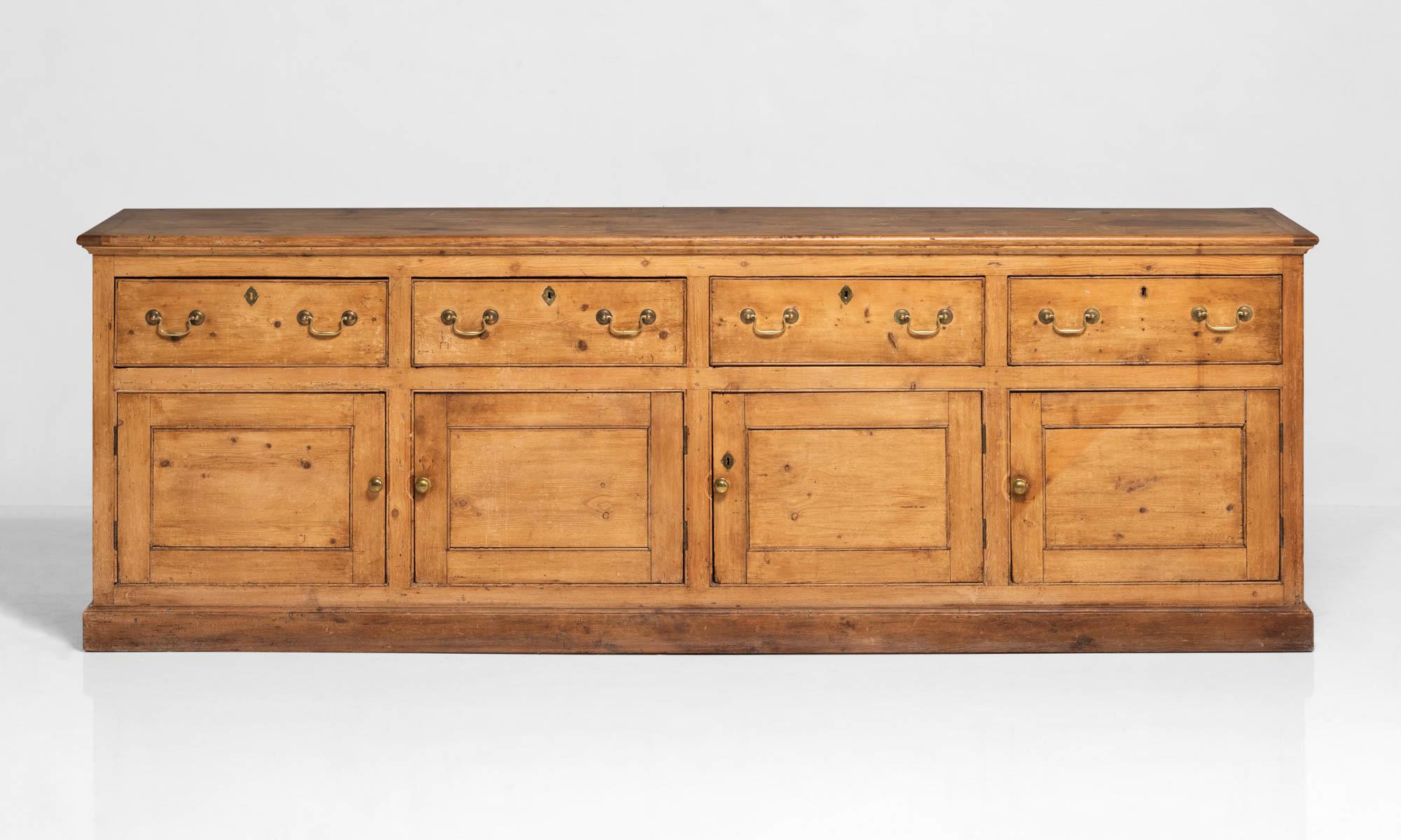 Pine sideboard, England, circa 1900

Handsome form with wonderful patina and brass hardware.