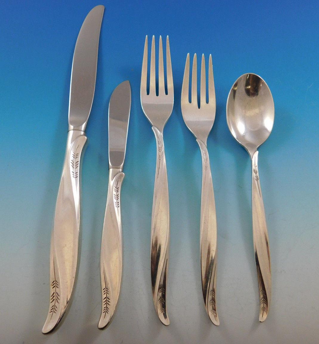 Pine Spray by International sterling silver flatware set of 43 pieces. This set includes: 

Eight knives, 9 1/4