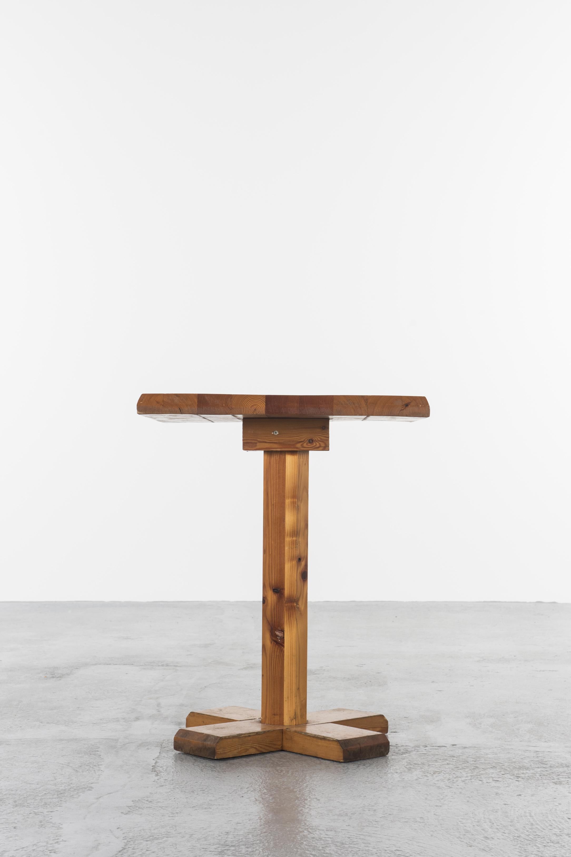 Two square pedestal tables, top, feet and base in pine in the style of Charlotte Perriand's 