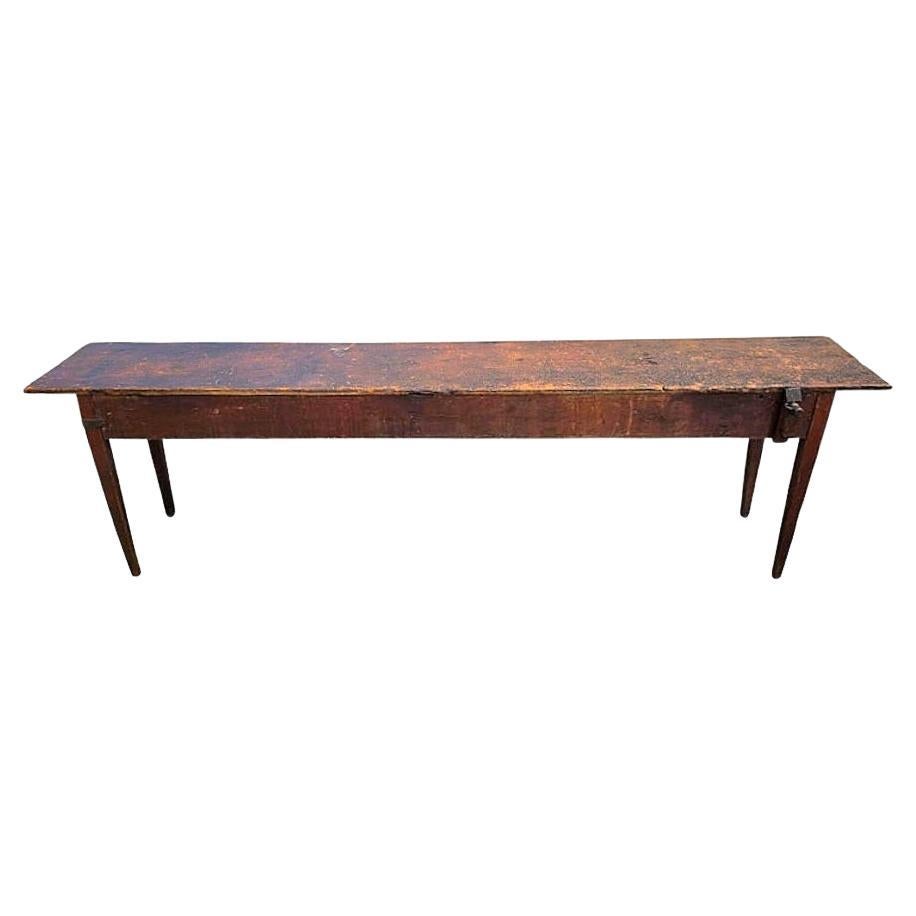 This is a really Grand piece. Likely hailing from Connecticut, Circa 1790 to 1810. The impressive top, a single Board of pine, measuring in at just over 100 in. This item retains all of its original surface patina. This table which later on became a