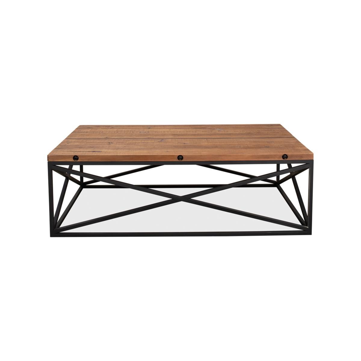 With reclaimed pine board top above an x frame cube form iron base. 

Dimensions: 55