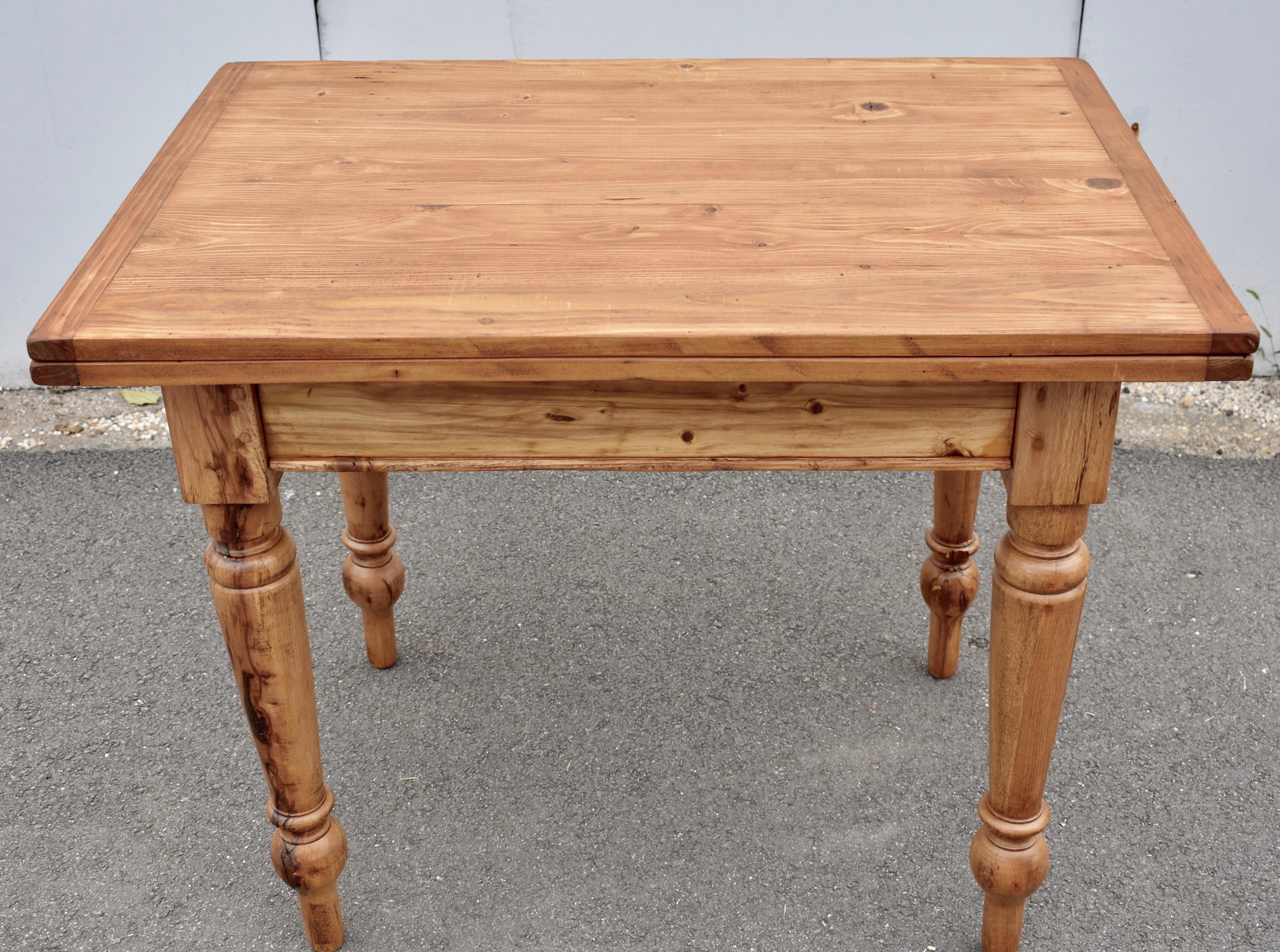26VJL72a Pine Turned Leg Swivel-Top Table 39”Wx28”Dx32”H (56”x39” open) Hungary, circa 1920 $1250.00
Like its cousins the drawleaf and the dropleaf , the swivel-top is another clever way of increasing the size of a table when circumstances require