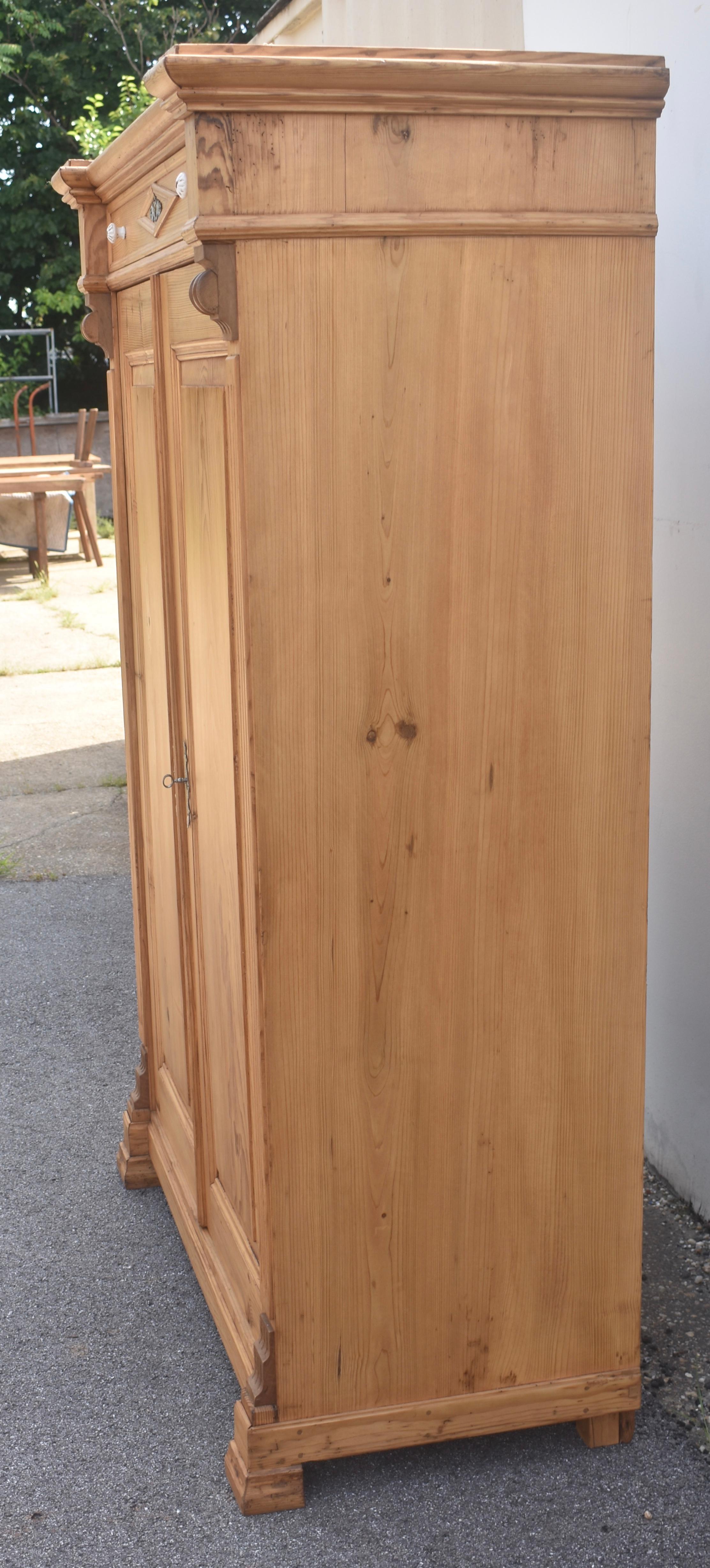 Pine Two Door Vertigo or Vertical Cabinet In Good Condition For Sale In Baltimore, MD