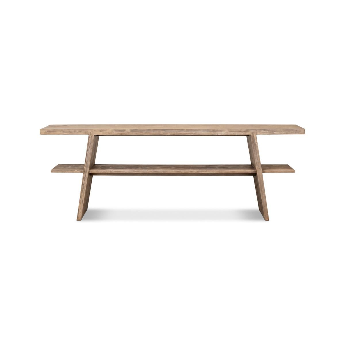 The Pine vineyards console table is a breathtaking piece of furniture that will instantly elevate your space. With its grand scale and unique geometric design, this console table is a true statement piece. The flaky pine finish adds a touch of