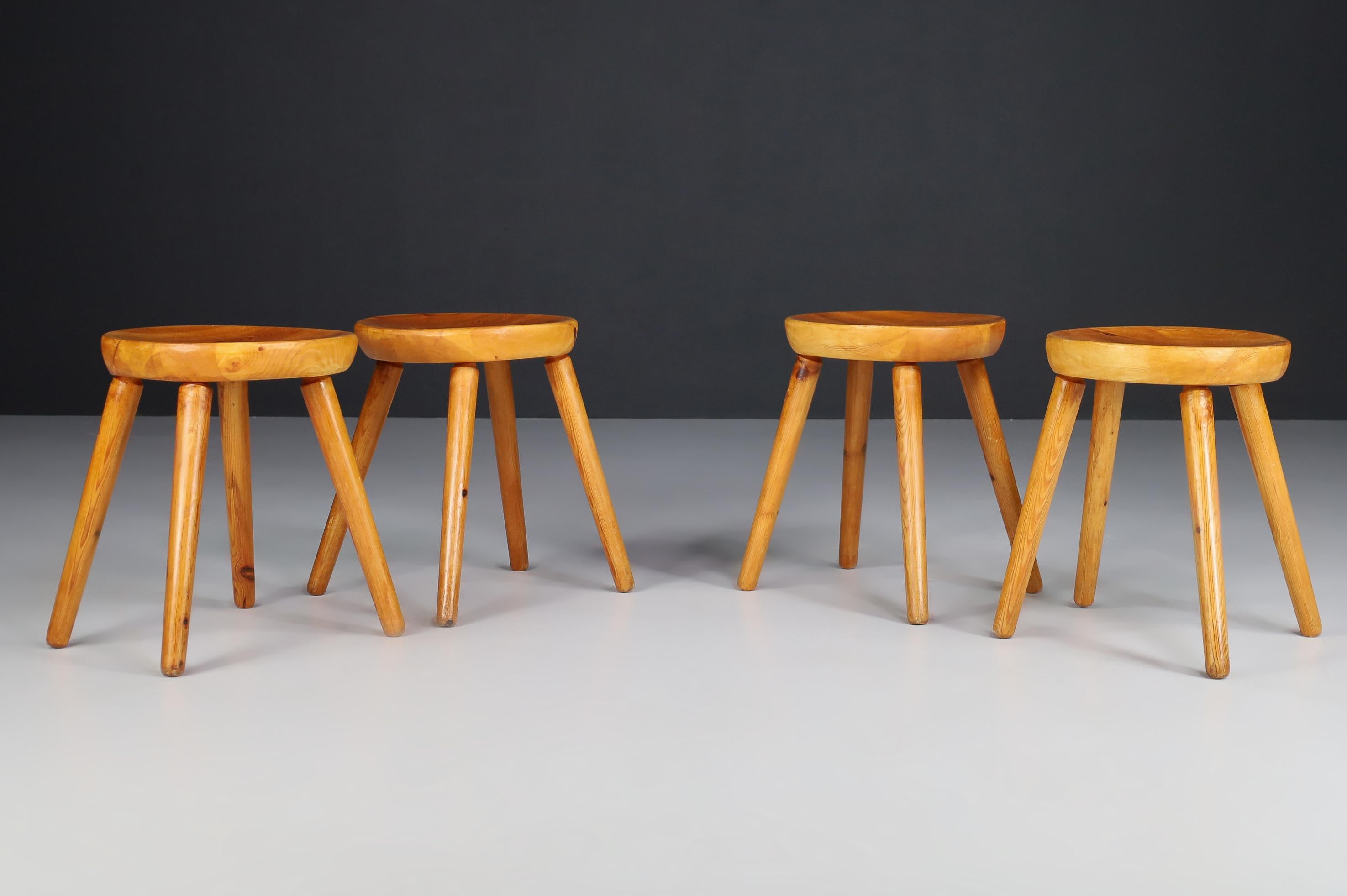 Pinewood French stools in the style of Charlotte Perriand France, 1950s.

Collectable pine stools in the style of Charlotte Perriand were made in France in the 1950s. No screws or hardware are used on stools. Beautiful joinery and grain details.