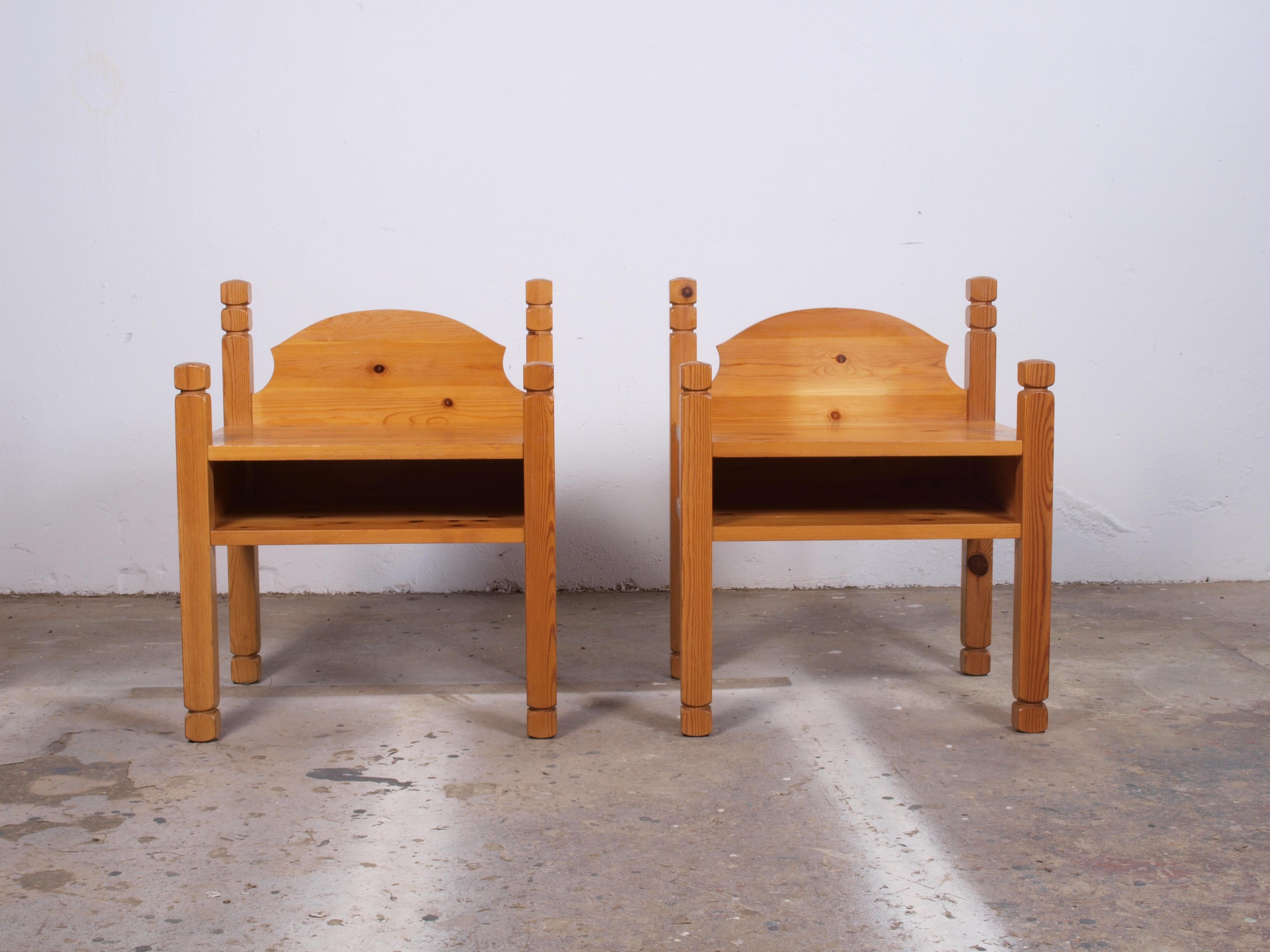 Pair of vintage bedside cabinets, designed and crafted in Denmark during the 1970s. These nightstands showcase a timeless aesthetic with their solid stained pine construction. The Scandinavian influence is evident in the clean lines and design,