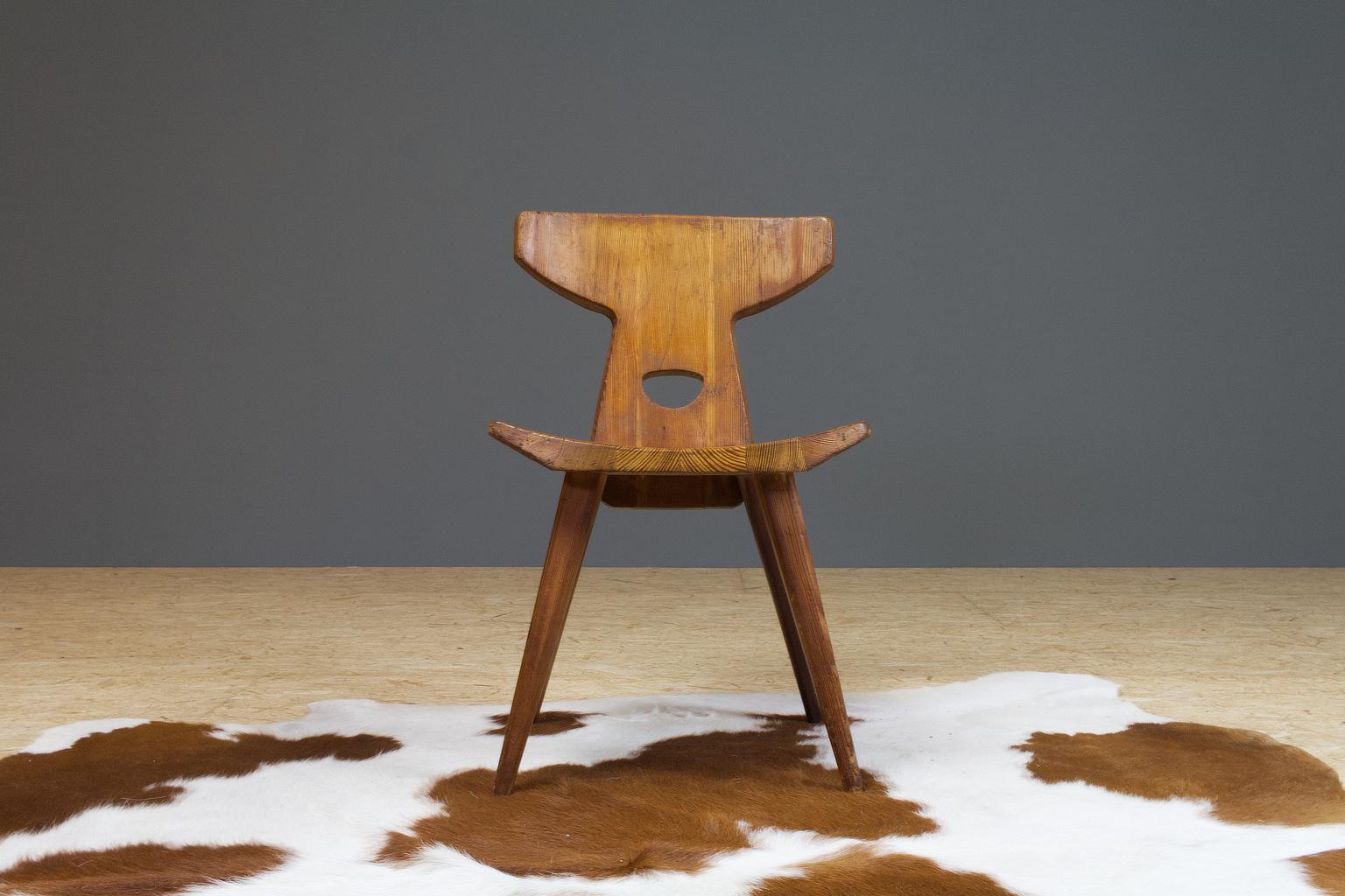 A Scandinavian Modern pine wooden dining room chair designed by Jacob Kielland-Brandt for Christiansen, Denmark, 1960. A great example of Danish craftsmanship, the chair is constructed without screws and uses only pen-hole connections, which are