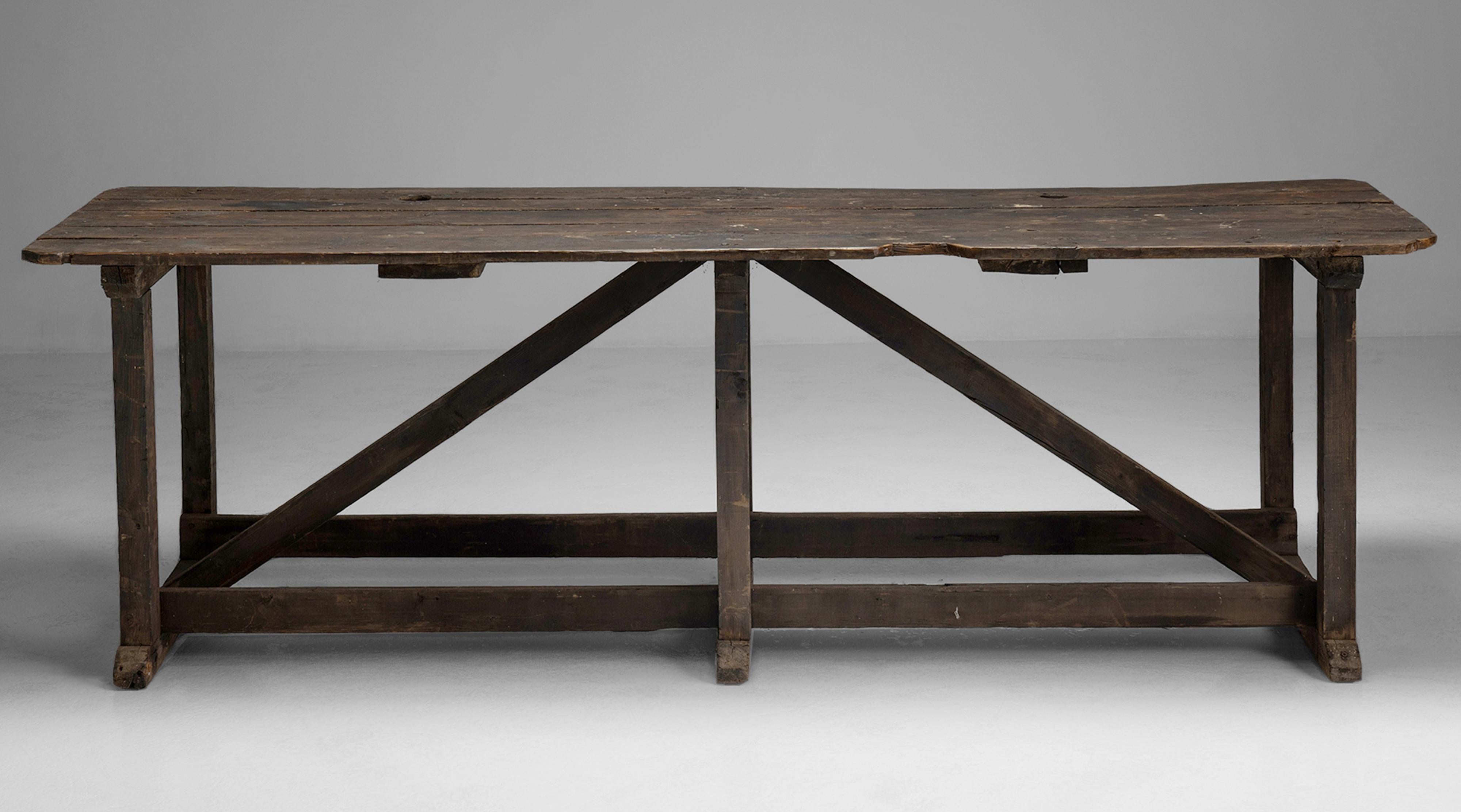 Pine Worktable, England circa 1900.

Pine table with architectural form, originally made for a Mill in the Midlands.