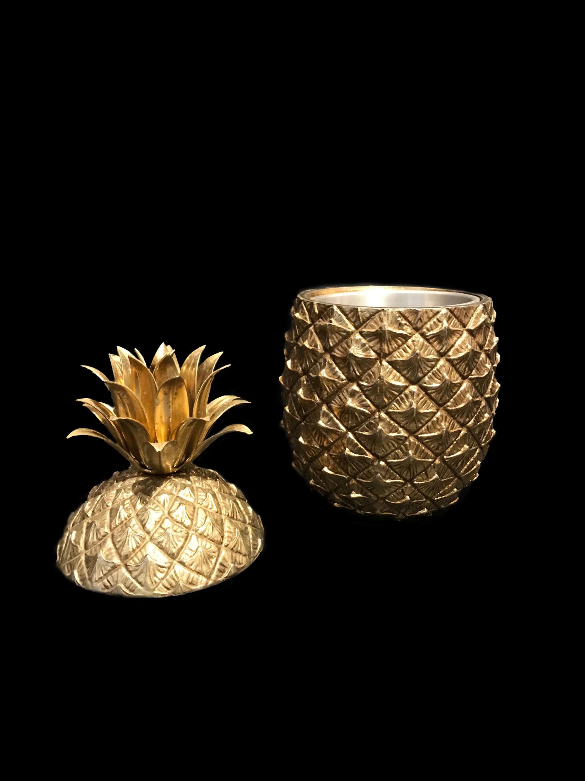 The pineapple ice bucket, designed by Mauro Manetti is world-famous and even has been copied many times!
The original and first productions had inside made of metal. The outside of this one is in gilt cast aluminium.
Mark beneath the base 
