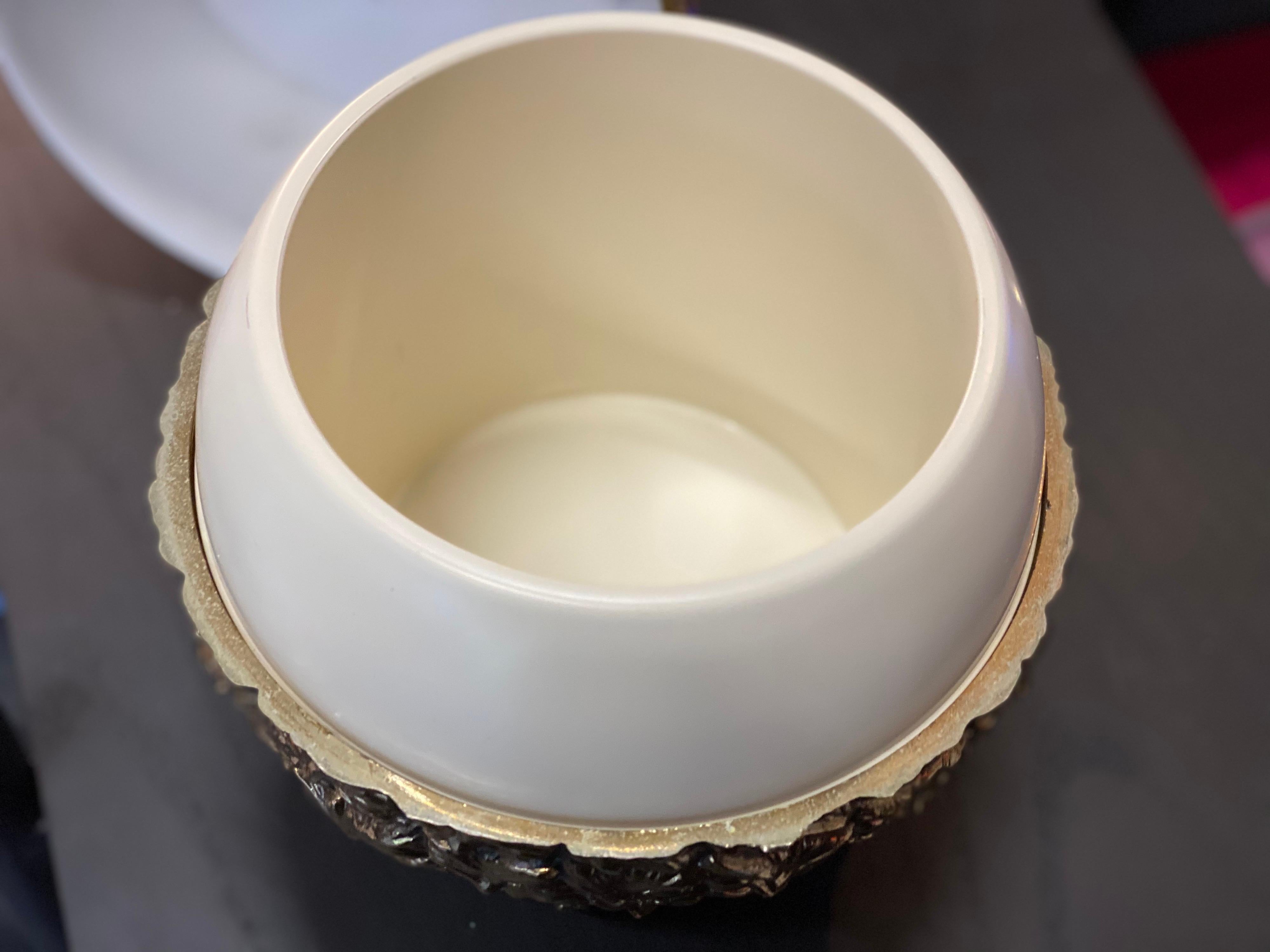 Beautiful golden pineapple ice bucket, designed by Hans Turnwald for the Swiss company Freddo Therm. This detailed ice bucket in the shape of a pineapple is a beautiful, luxurious addition to your home bar or simply as a special decoration for that