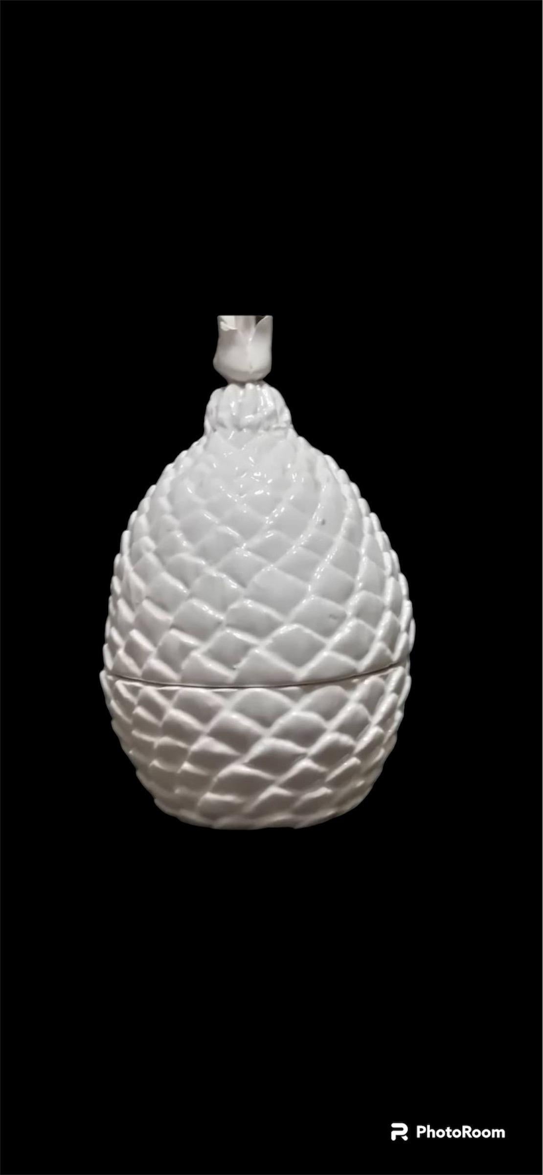 Unveil the allure of Italian craftsmanship with this stunning pineapple porcelain, a treasure from 1980s Bassano, Italy. Immerse yourself in the rarity of this piece, a hand-painted porcelain sculpture that stands as a testament to the artist's