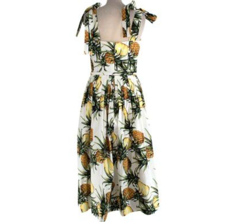 Oscar de la Renta Pineapple Print Tie-Shoulder Midi Dress

- Square neck sleeveless midi dress with a A-line skirt
- all over pineapple print
- belted
- tie shoulder
- Hidden zip down the back 

Made in Italy
73% Wool 27% Silk
Dry clean only