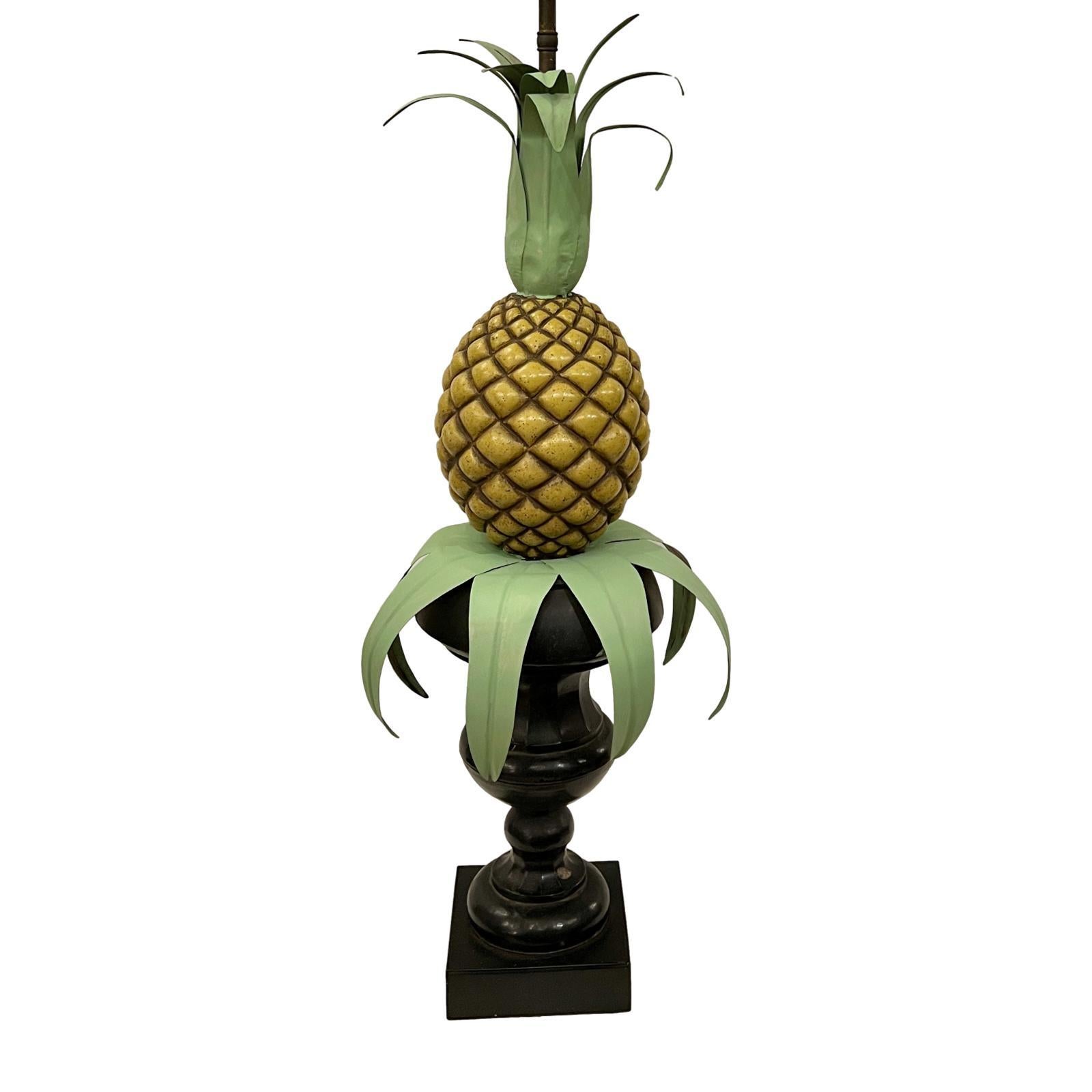 A circa 1940s Italian painted tole metal lamp in the shape of a pineapple.

Measurements:
Height of body: 29