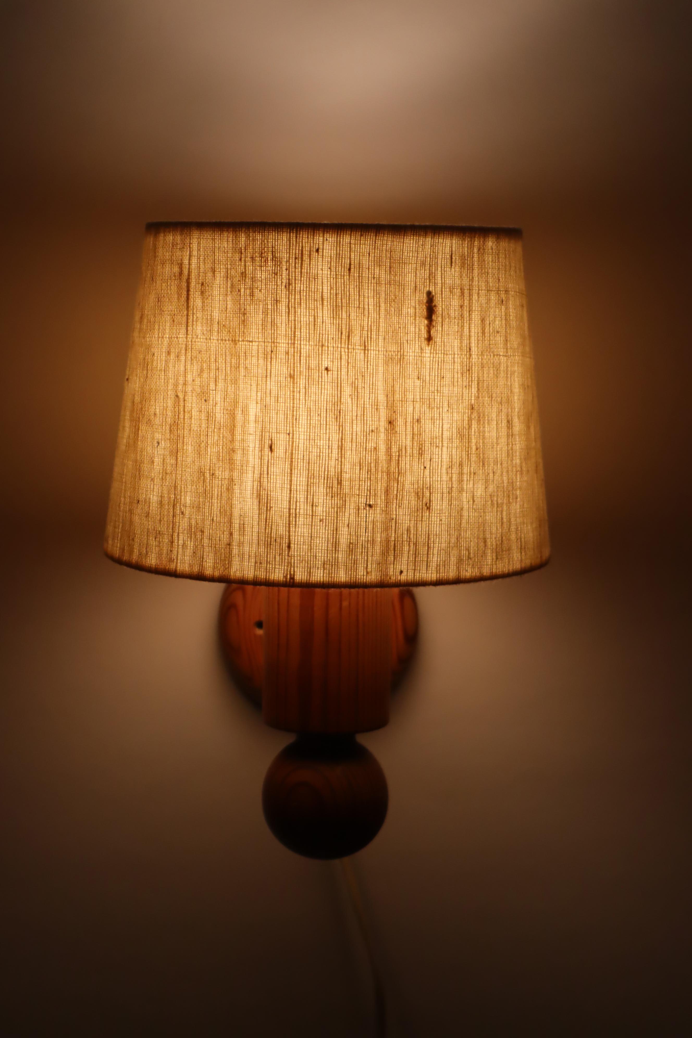 Late 20th Century Pinewood wall lamp with lampshade from Luxus Sweden For Sale