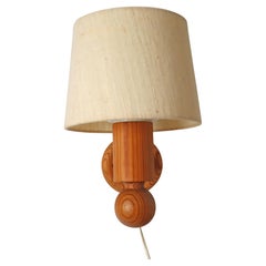 Pinewood wall lamp with lampshade from Luxus Sweden