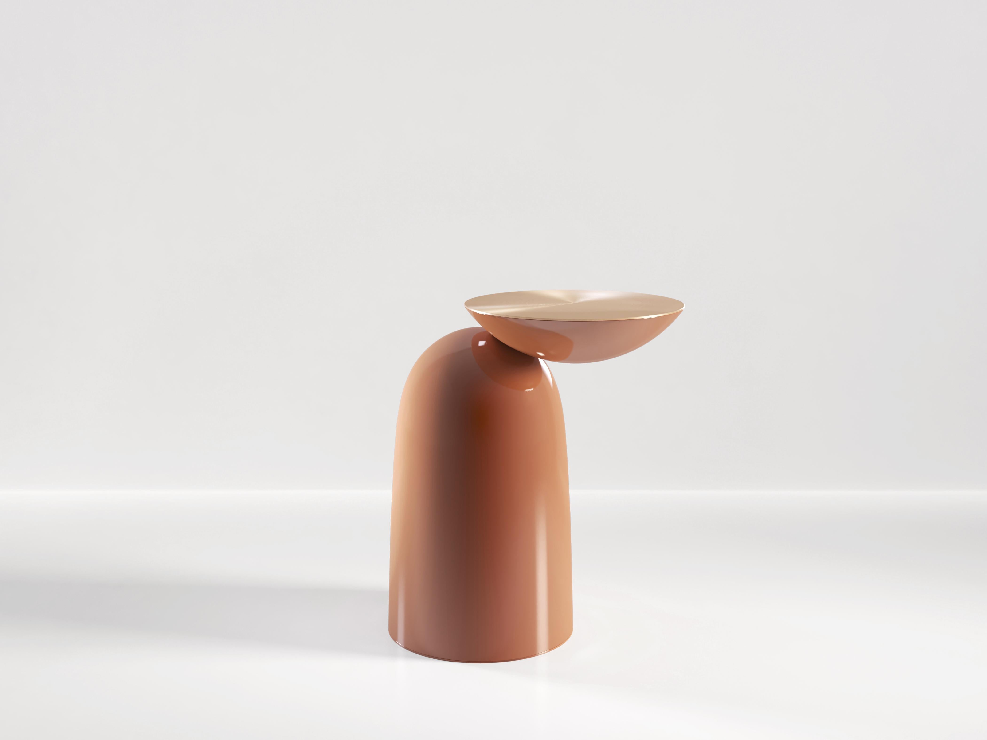 Pingu is a playful addition to any room, offering up a place for a drink or an ashtray beside your chair. An inverted dome is supported by a soft-shaped base which it is barely touching. A metal top adds a touch of luxury. Pingu is available in any