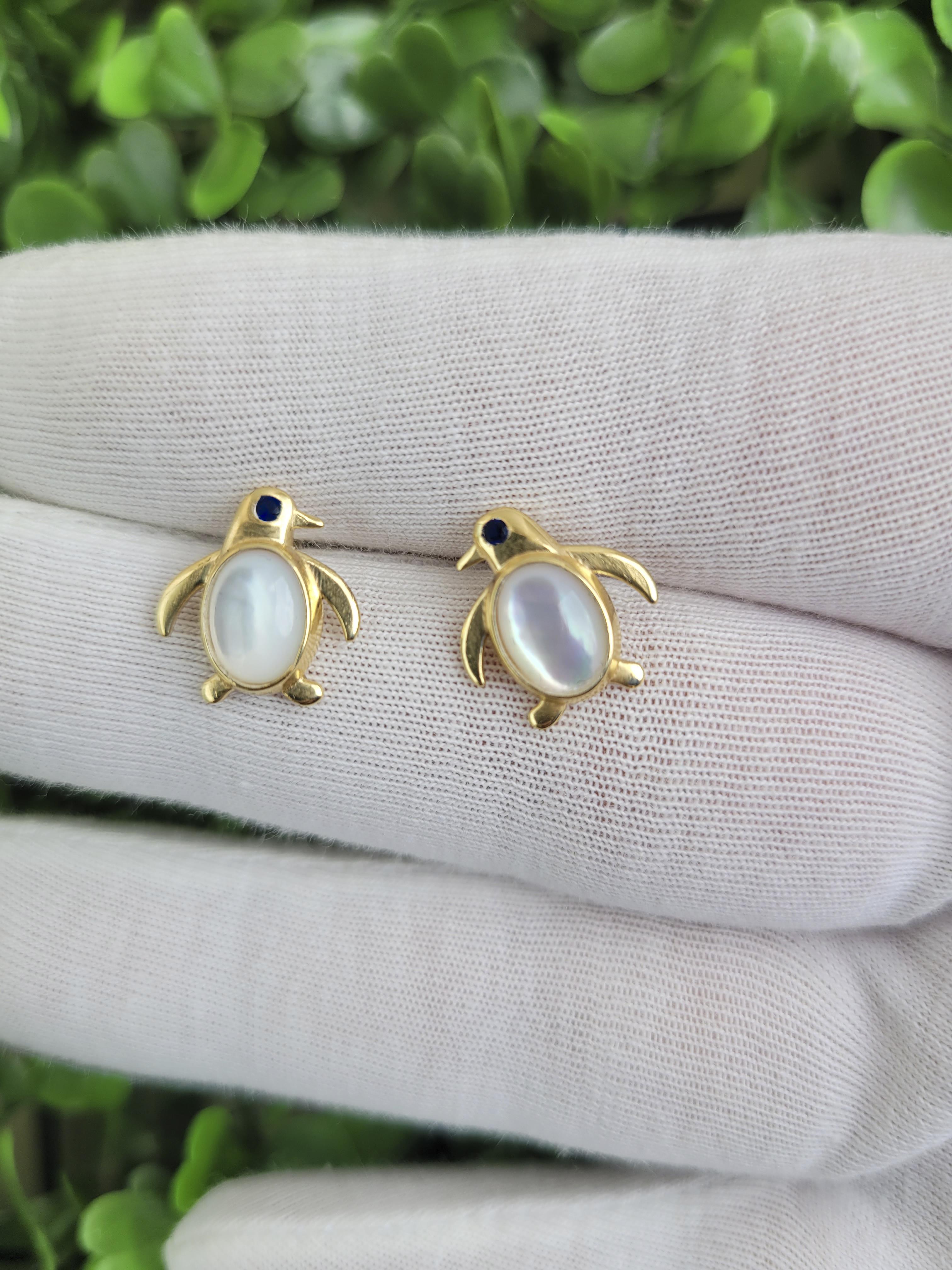 Orecchini Pinguino in oro 14k con borchie. Orecchini Pinguino in oro con madreperla ovale e spinello nero. Orecchini invernali, Orecchini con animali. Orecchini per il nuovo anno. Gioielli di Marin.


Metallo: oro 14k
Peso: 2.2 gr
Dimensioni degli
