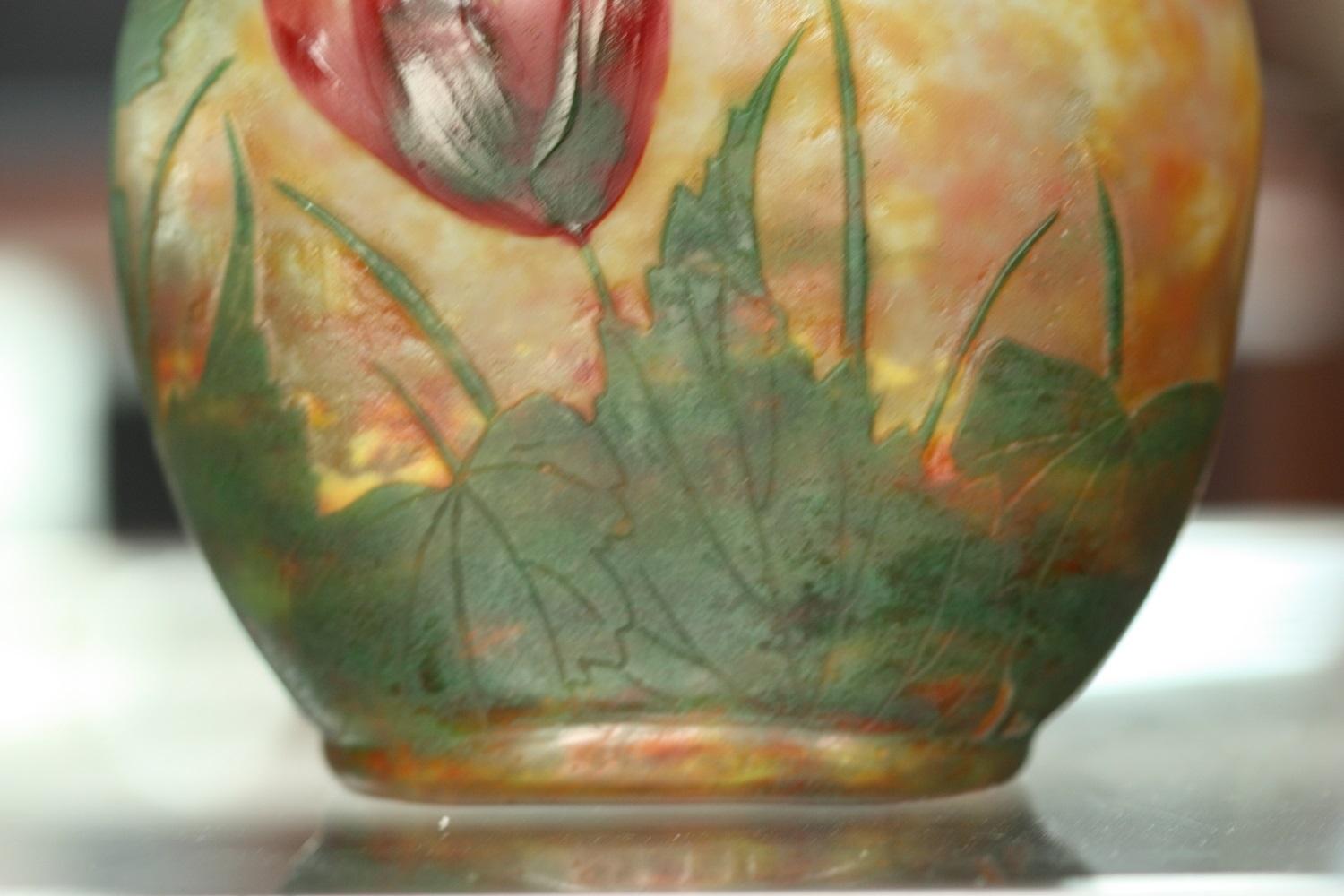 From the Pinhas collection
A fine Daum Nancy wheel-carved cameo glass vase with low relief applied decoration
France, circa 1915
Signed with intaglio mark Daum Nancy with Lorraine cross
Dimension:
Width 5.70 in. (14.5 cm.)
Depth 3.14 in. (8