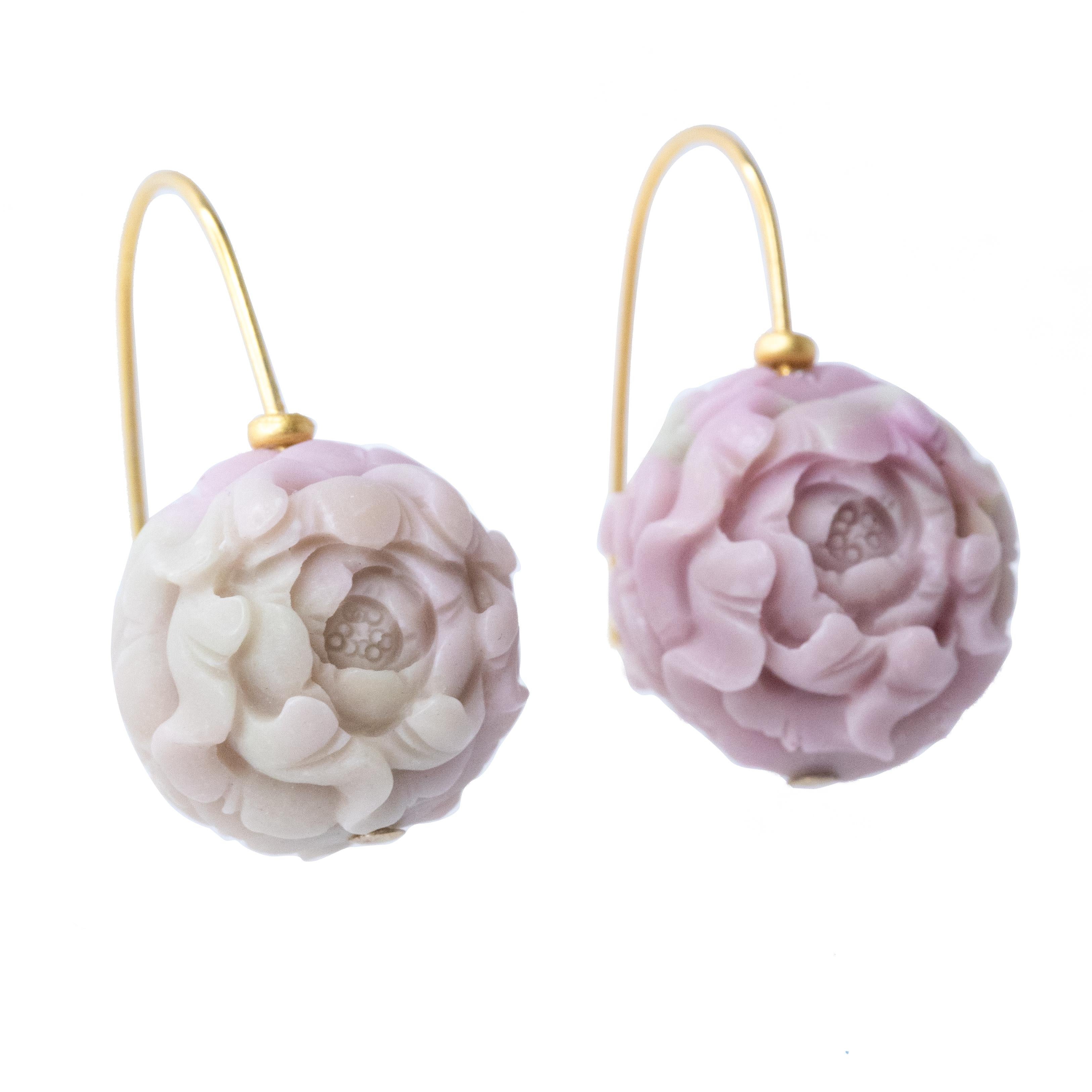 These earrings are crafted from rare Pink Carnelian Agate. Hand carved Peony Flower Bead by skilled artisans. Each bead is a unique masterpiece, imbued with intricate detail and craftsmanship that cannot be found anywhere else. Elevate your style