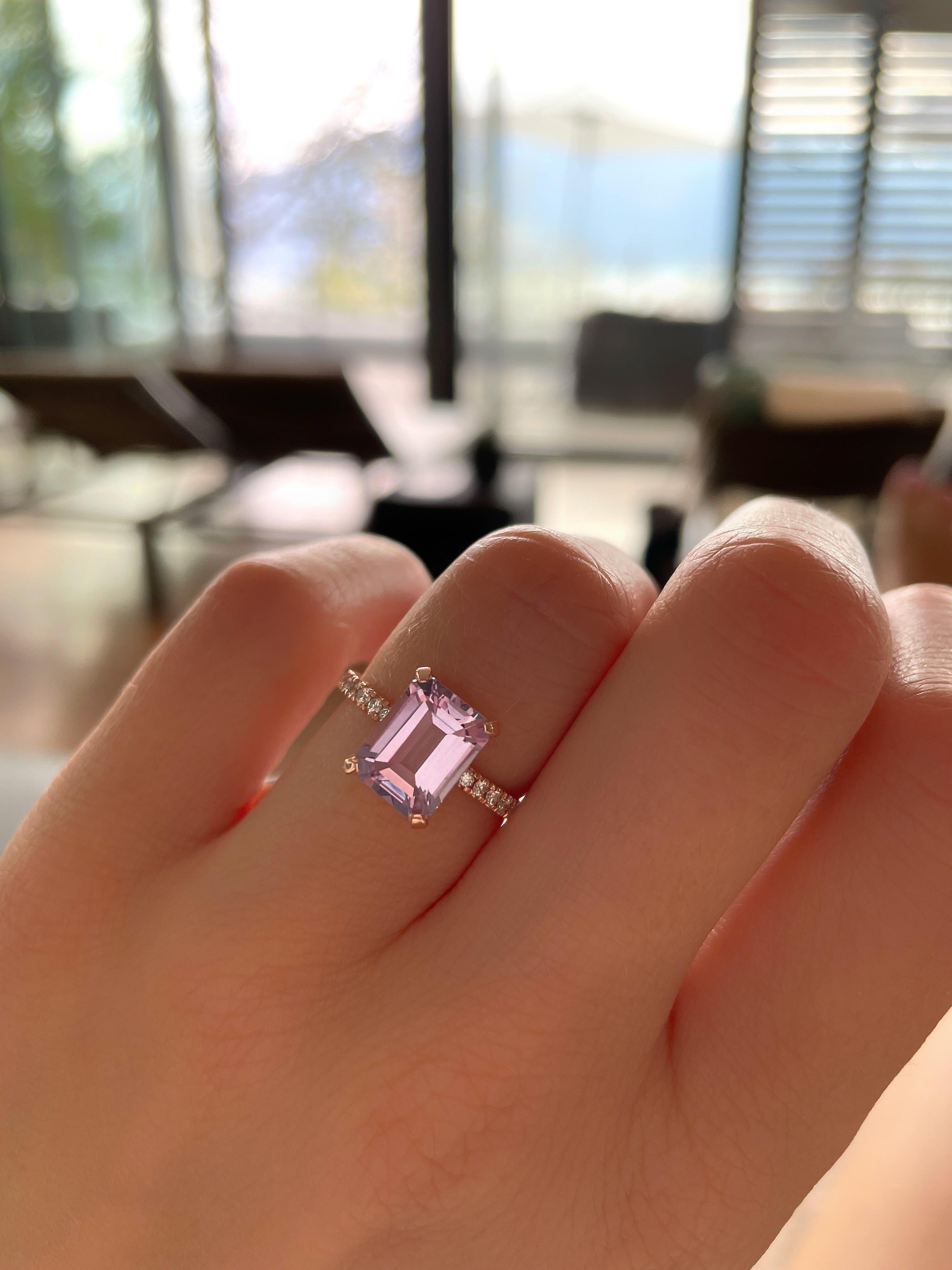 This pink amethyst and diamond ring set in 18K recycled rose gold is a romantic dream. Nestled in a bale of 24 diamonds, with pave set white diamonds on the band as well as diamonds on the prongs, this beauty sparkles in every direction and angle.