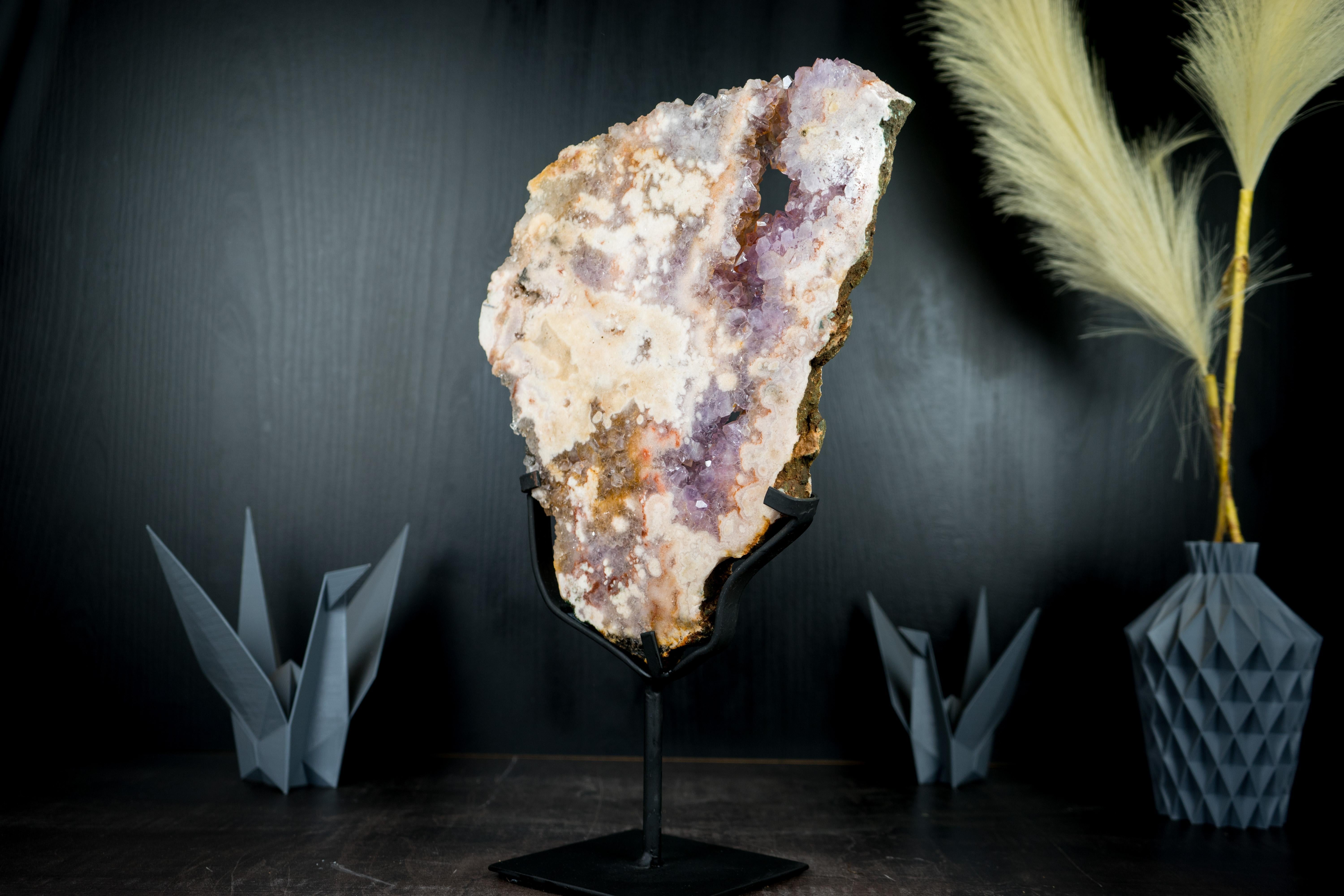 Unique and gorgeous, this Pink Amethyst specimen is one of the most colorful Pink Amethysts we've had the pleasure to work with. This specimen will surely make a fantastic addition to your collection or serve as a centerpiece for your