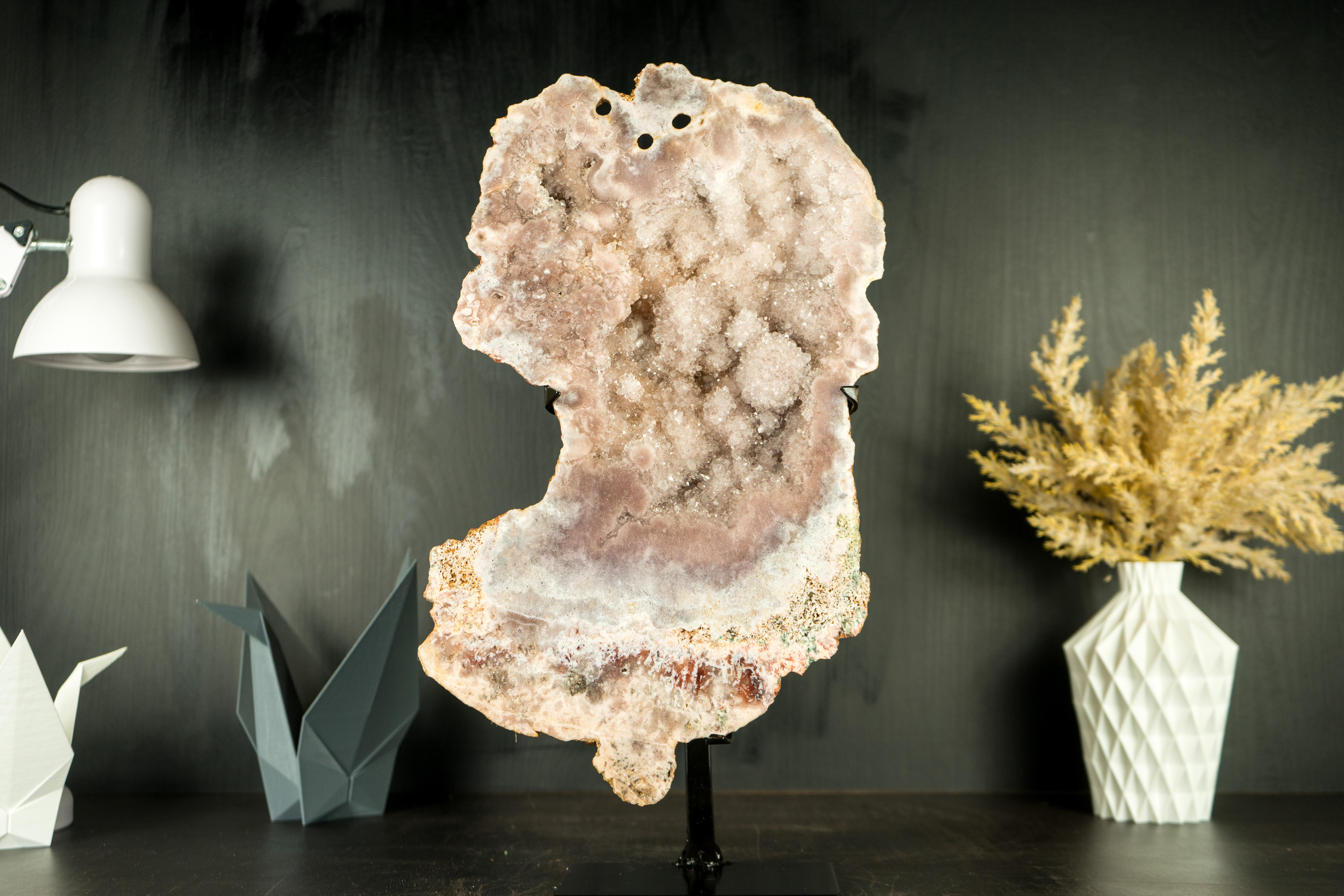 Natural Artwork: Pink Amethyst Geode Slice with Sparkly Botroydal Flowers 

▫️ Description

A Pink Amethyst Geode Slice displays unique features highlighted by its aesthetic structure. Offering beautiful form and colors, this specimen is an ideal