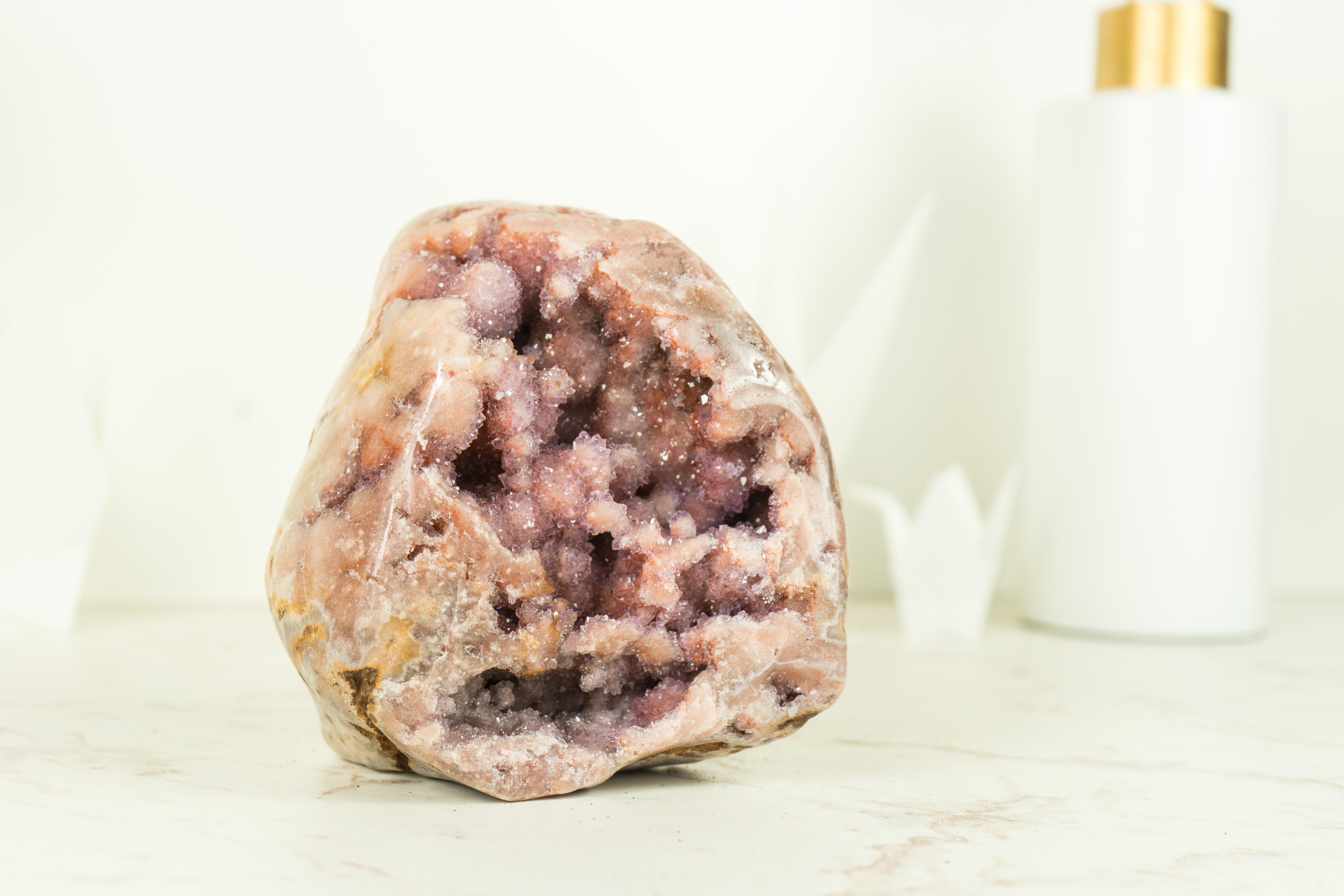 Nature's masterpiece at its finest, with gorgeous Pink Amethyst druzy this Pink Amethyst Geode boasts unparalleled beauty and quality, making it a magnificent addition to your collection or an exquisite centerpiece for your home decor.

With