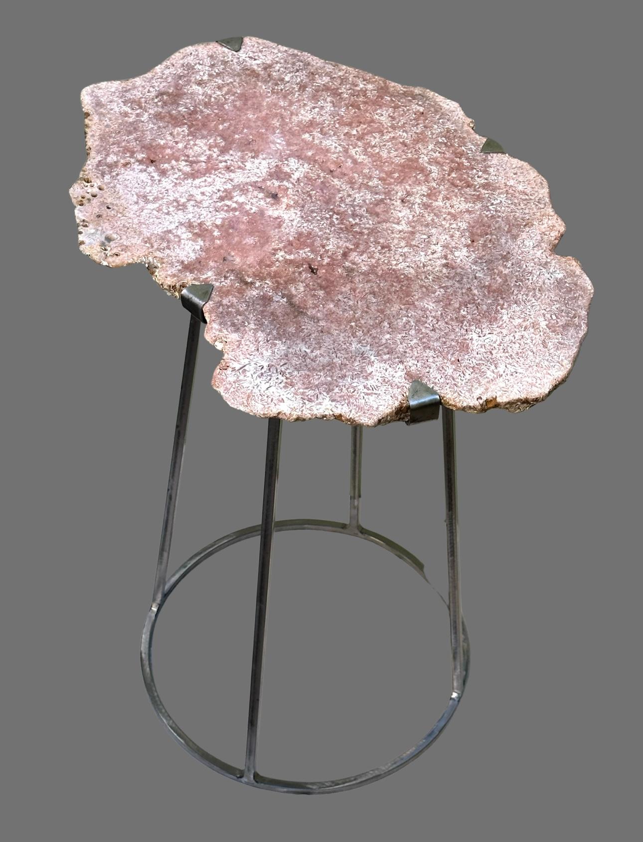 Table forged in natural iron with varnish,
 Natural Rose Amethyst top
single table due to the naturalness of the stone.