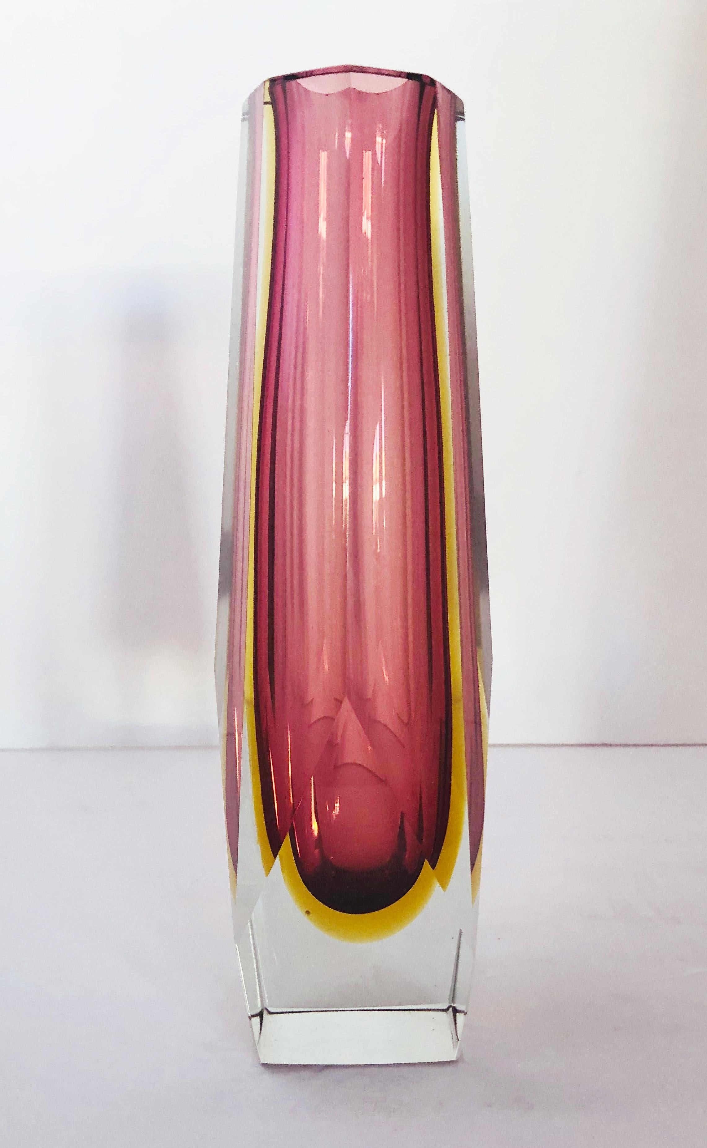 Vintage Italian faceted Murano glass vase blown in Sommerso technique, with amber and pink amethyst colors Designed by Mandruzzato circa 1960s / Made in Italy
Measures: Height 11.5 inches, diameter 4 inches
1 in stock in Palm Springs currently ON