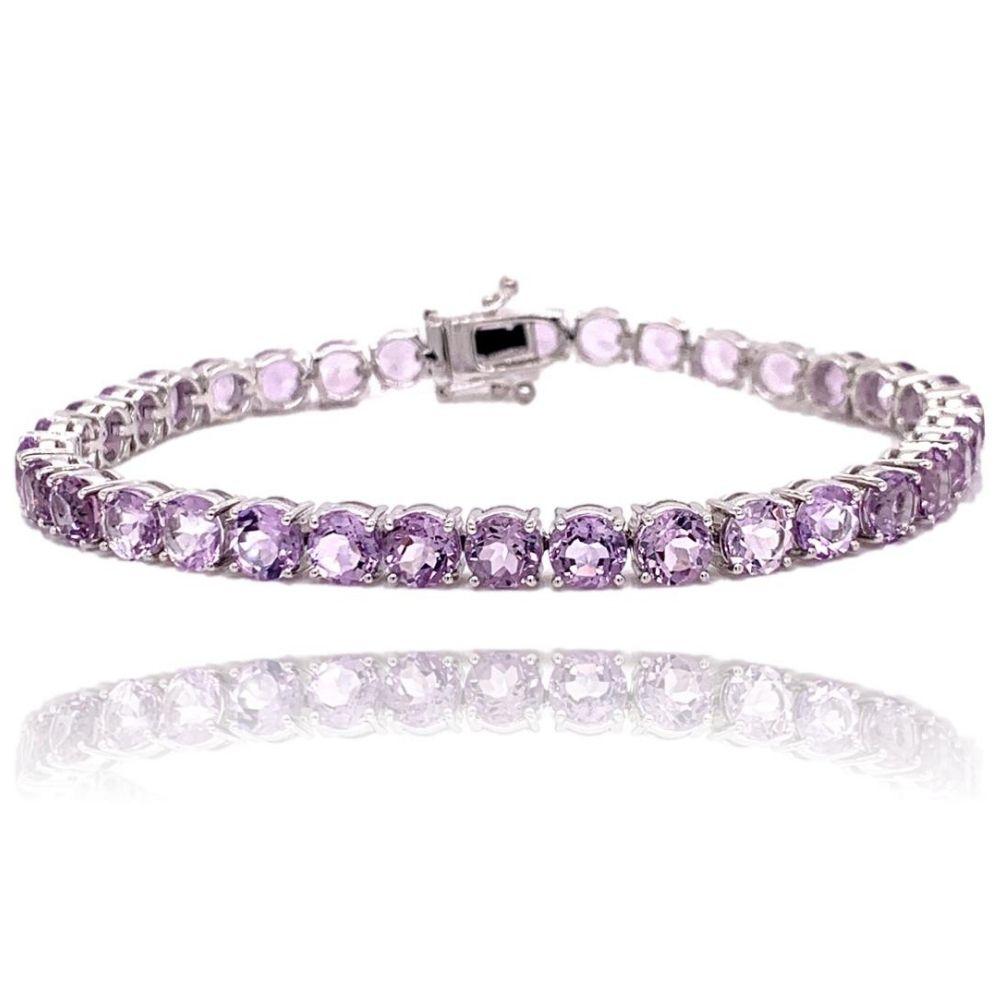 This stunning 10K White Gold Pink Amethyst Tennis Bracelet has 35 5mm round vibrant Pink Topaz all with 4 prong setting. The bracelet is 7