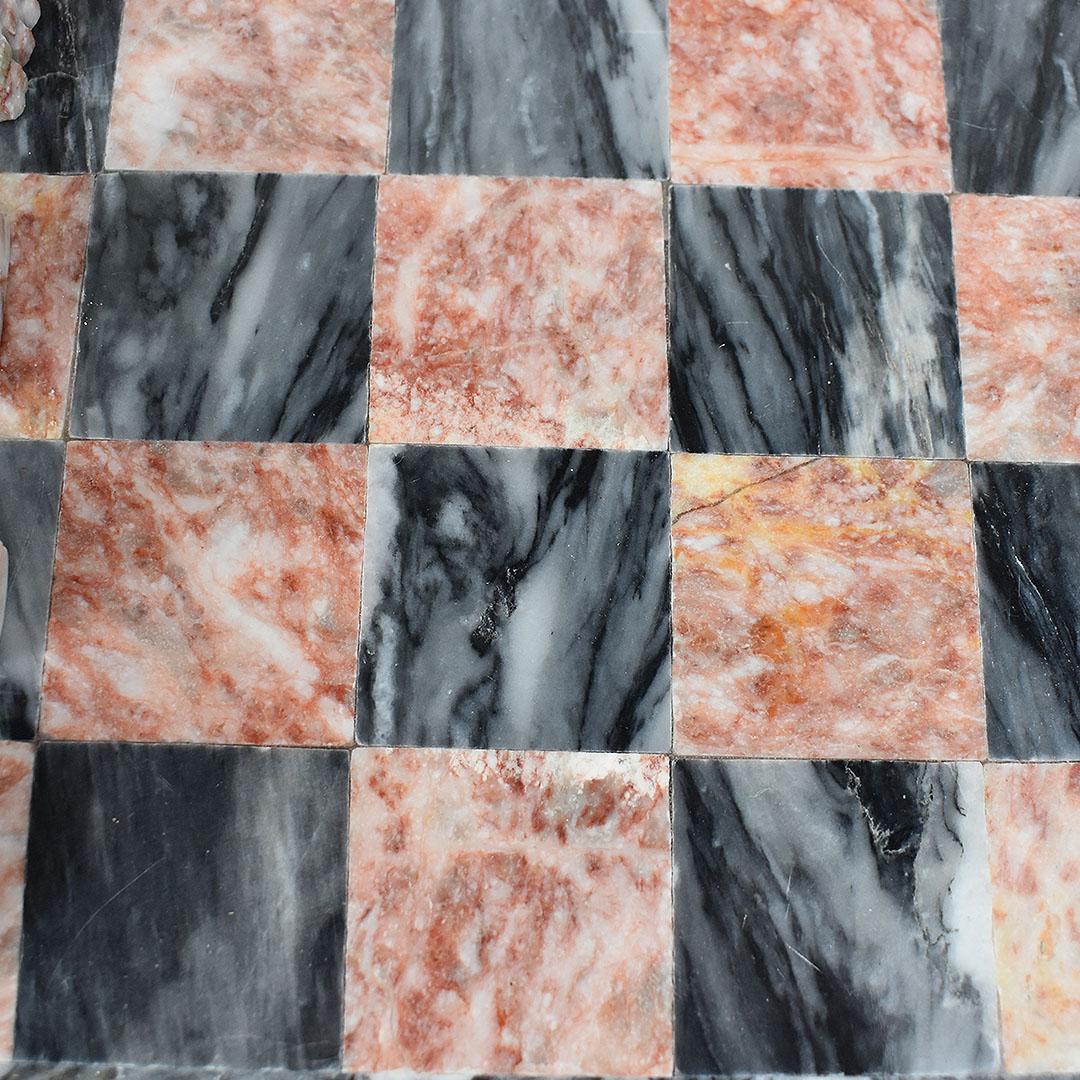 pink and black marble chess set
