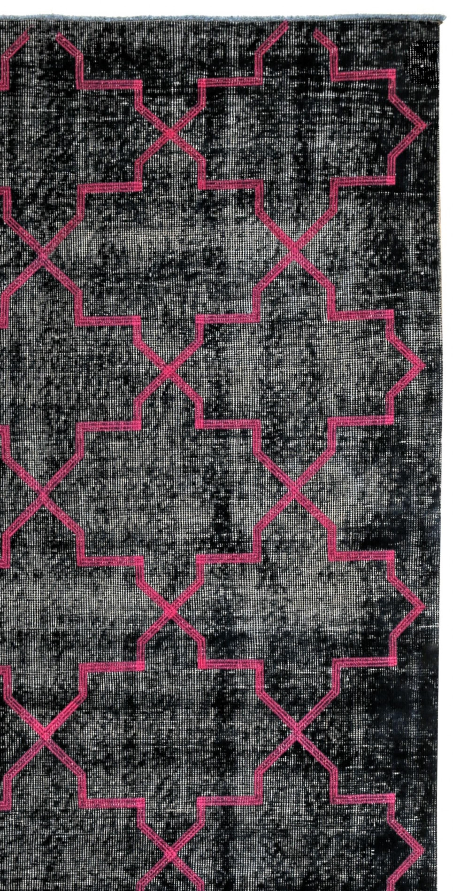 This is a fine example of an overdyed area rug. These rugs demonstrate a process best described as 'The modern palette applied to classics'. It consists of an added step to the finishing process in which the rug is antique washed, sheared, and