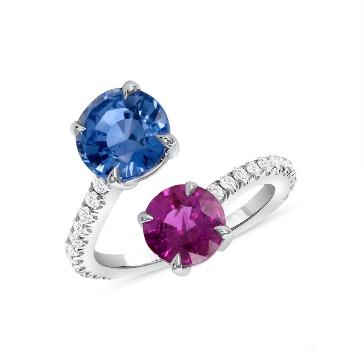 18K white gold ring, featuring a 2.40-carat Ceylon Blue Sapphire paired with a 1.60-carat Pink Sapphire, accented by round diamonds totaling 0.28ct. Round Blue Sapphire is GIA certified. 