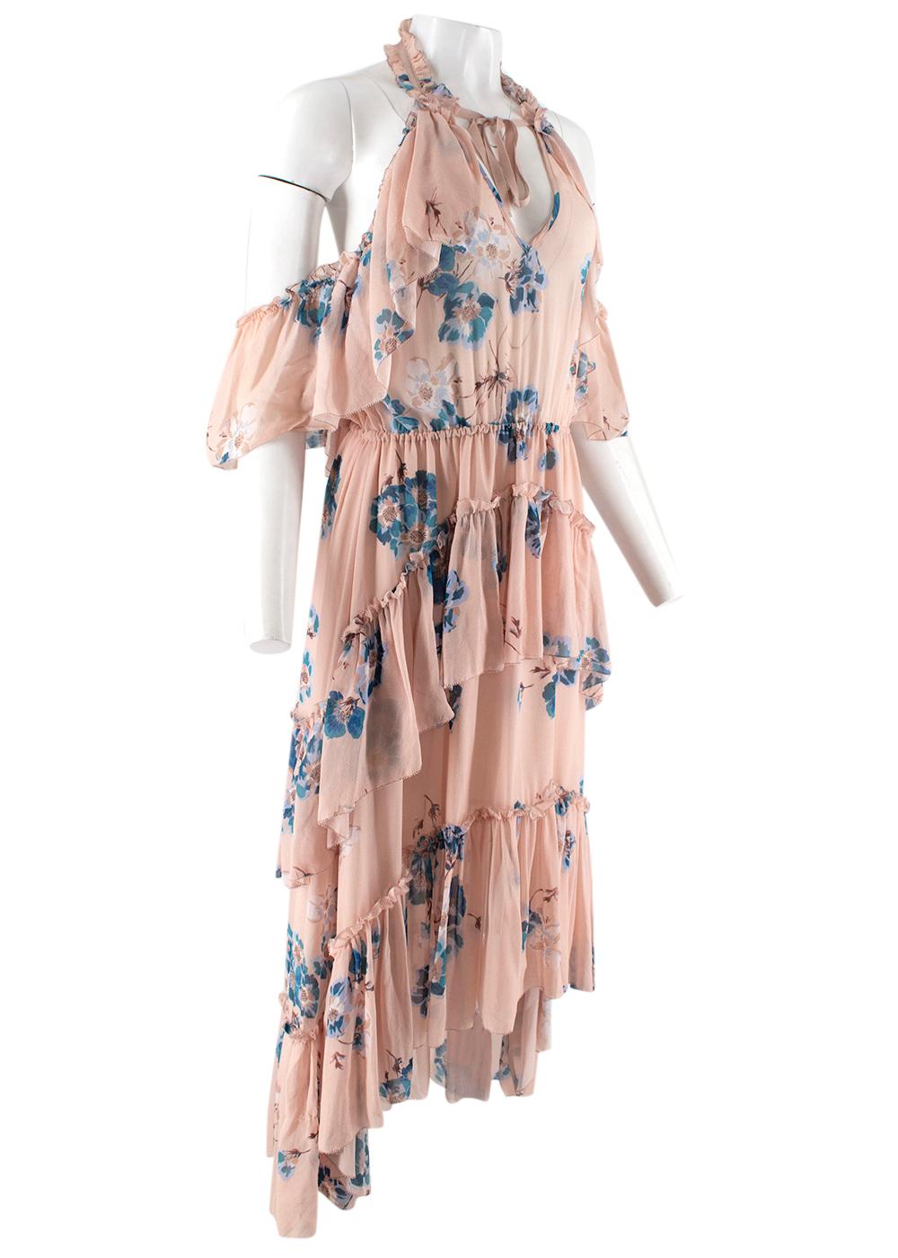 Ulla Johnson Pink And Blue Floral Chiffon Halterneck Dress 

- Halterneck tiered backless maxi dress with ruffle details 
- Light pink silk fabric with delicate blue floral print 
- Elasticated waistband and lined with an asymmetric hem 

Materials
