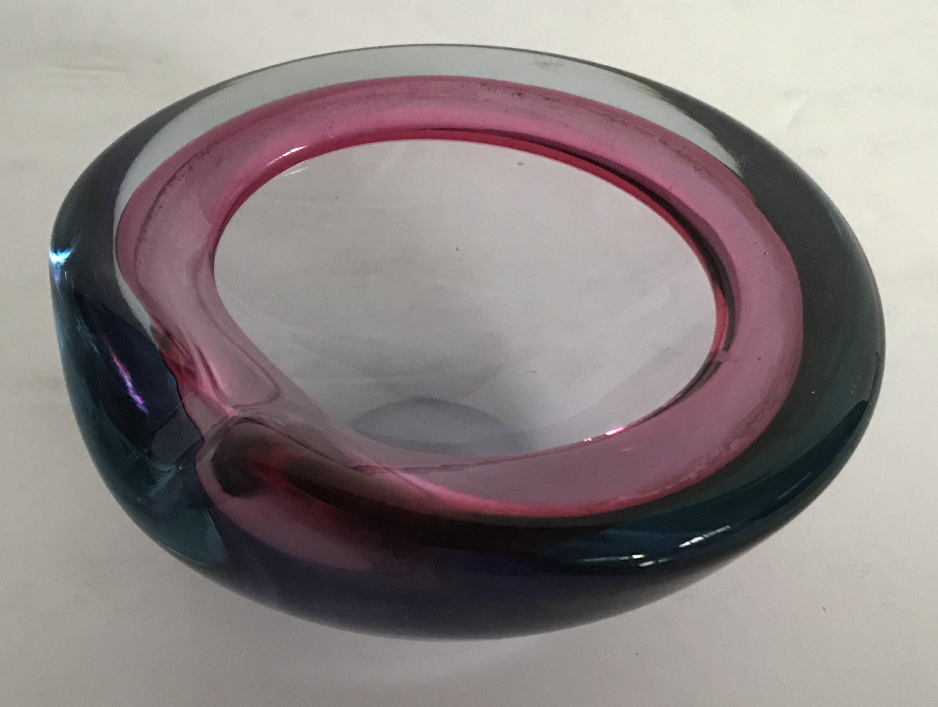 Vintage pink and blue Murano glass ashtray or candy bowl / Made in Italy, circa 1960s 
Measures: width 5 inches, depth 4.5 inches, height 2 inches 
1 in stock in Palm Springs ON 50% OFF SALE for $399 !!
Order Reference #: FABIOLTD G196
This piece