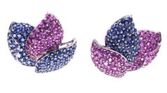 Clips d'oreilles en or blanc 18 carats