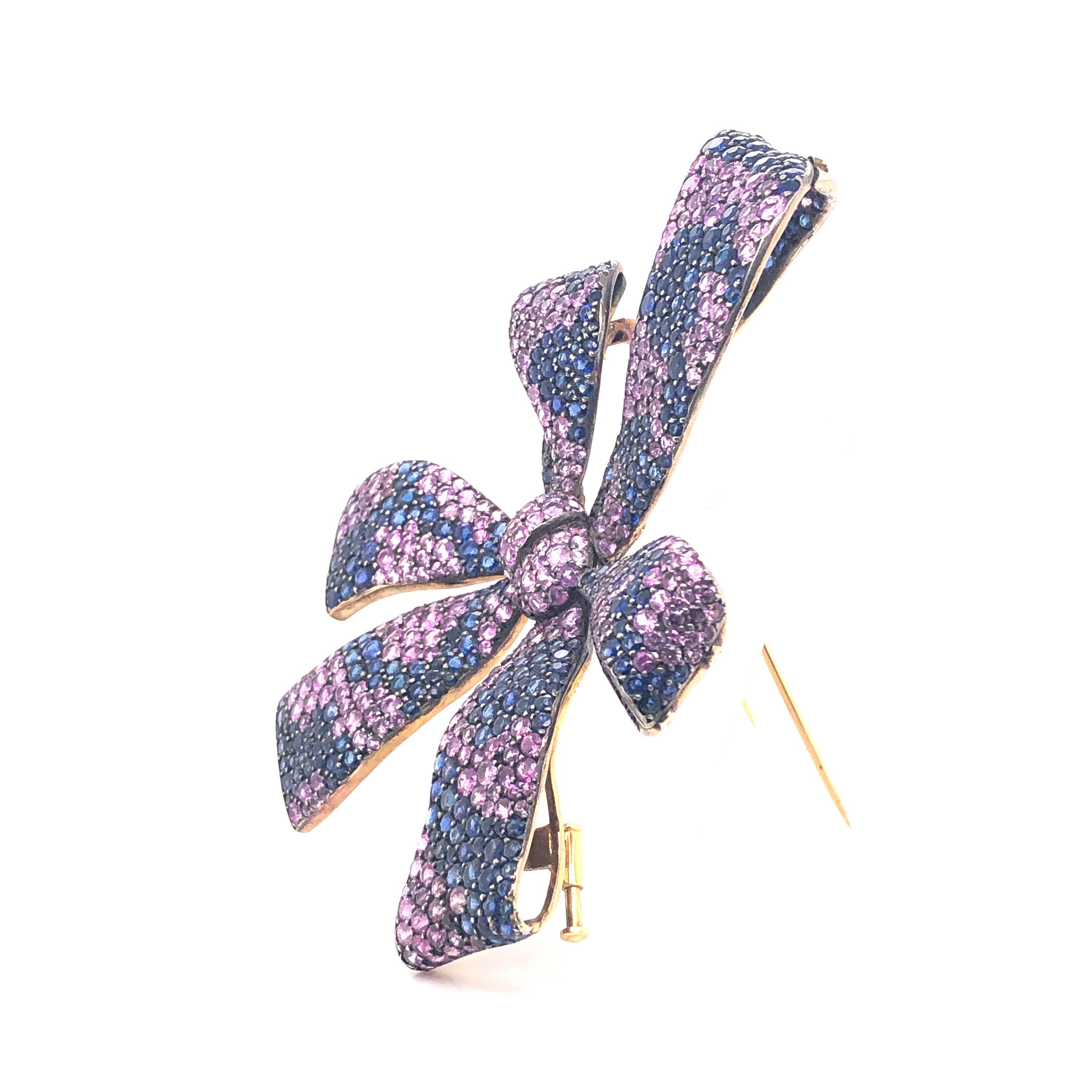 Modern Moira Design Pink and Blue Sapphire Silver and Gold Bow Brooch For Sale