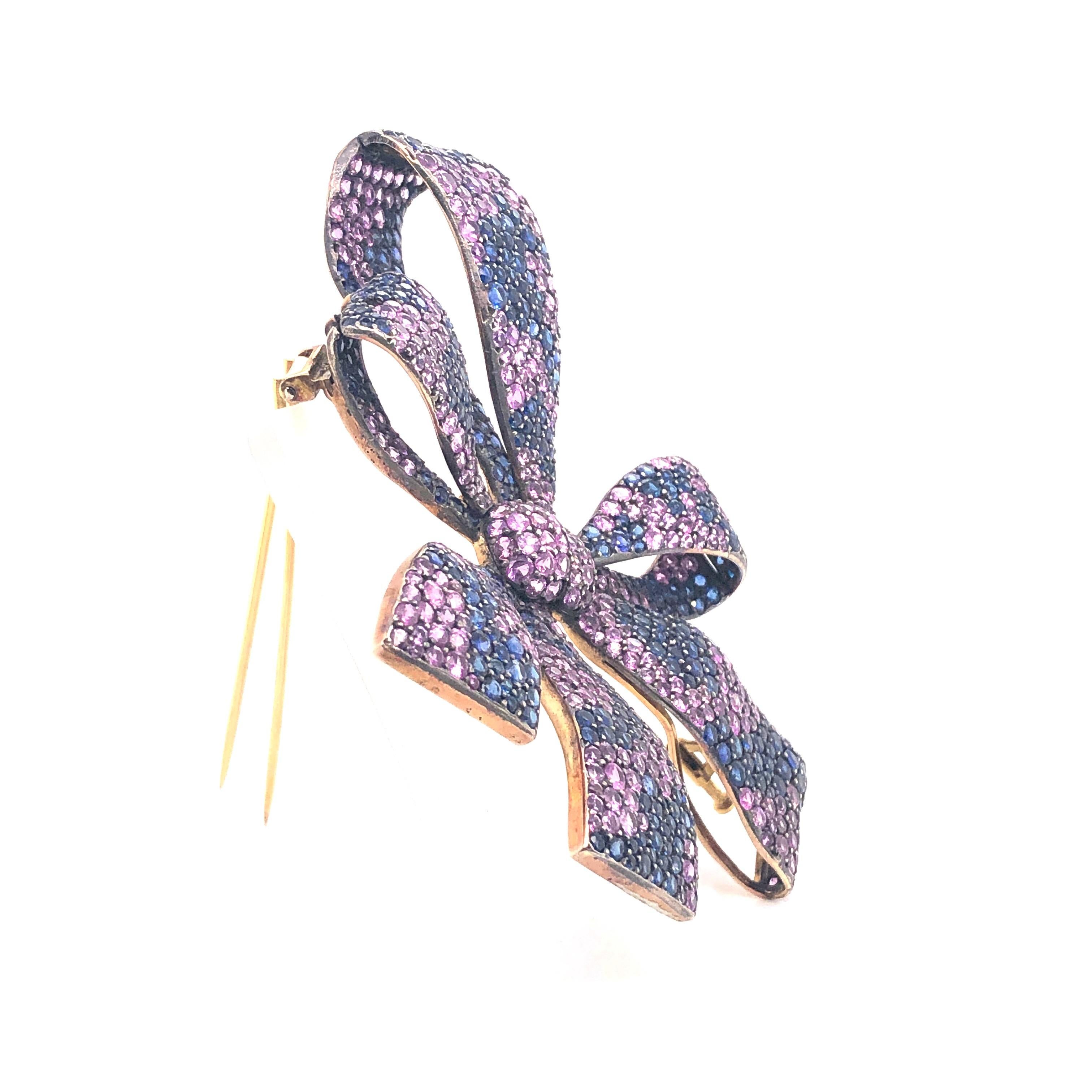 Round Cut Moira Design Pink and Blue Sapphire Silver and Gold Bow Brooch For Sale