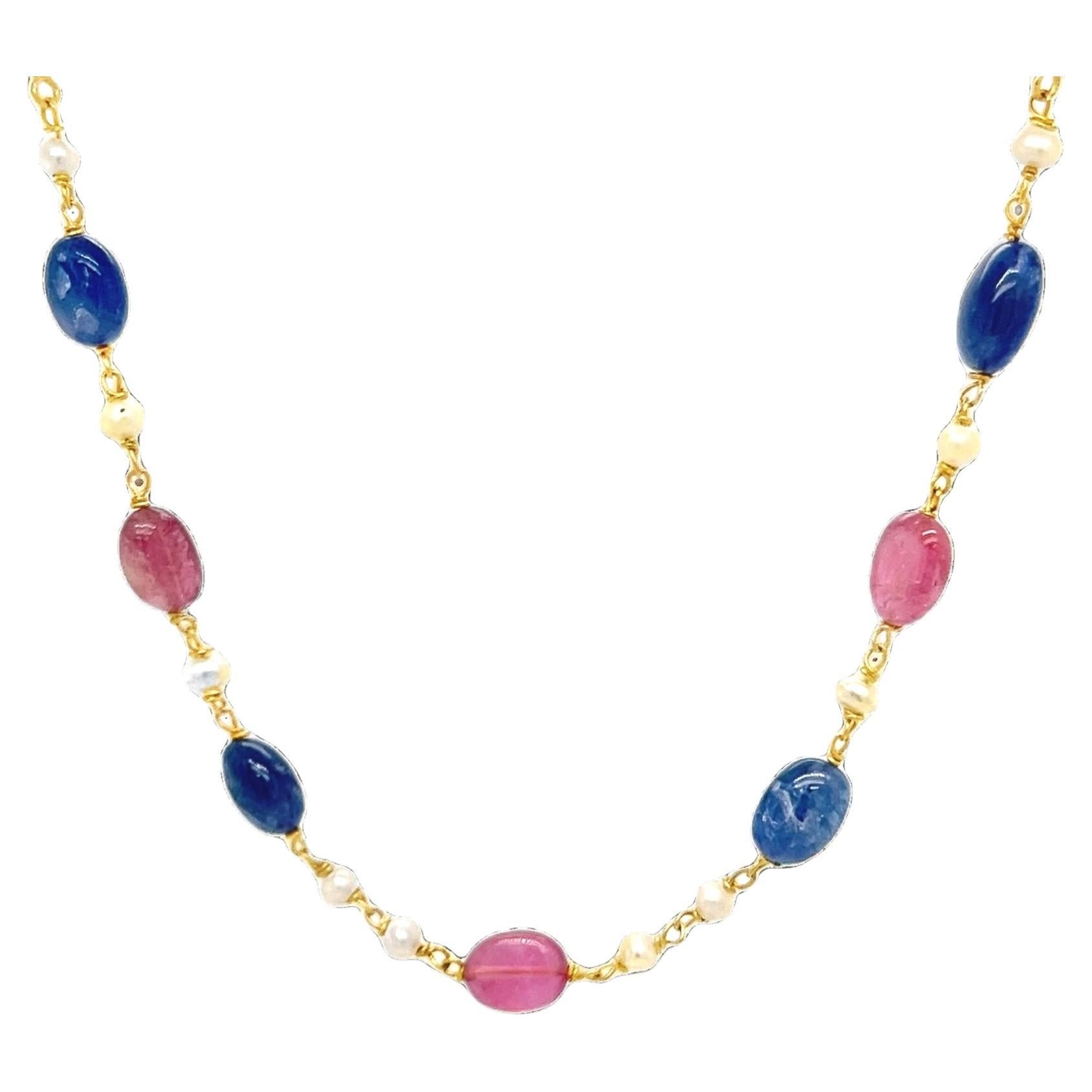 Pink and blue sapphire necklace in 18 karat yellow gold with seed pearls For Sale