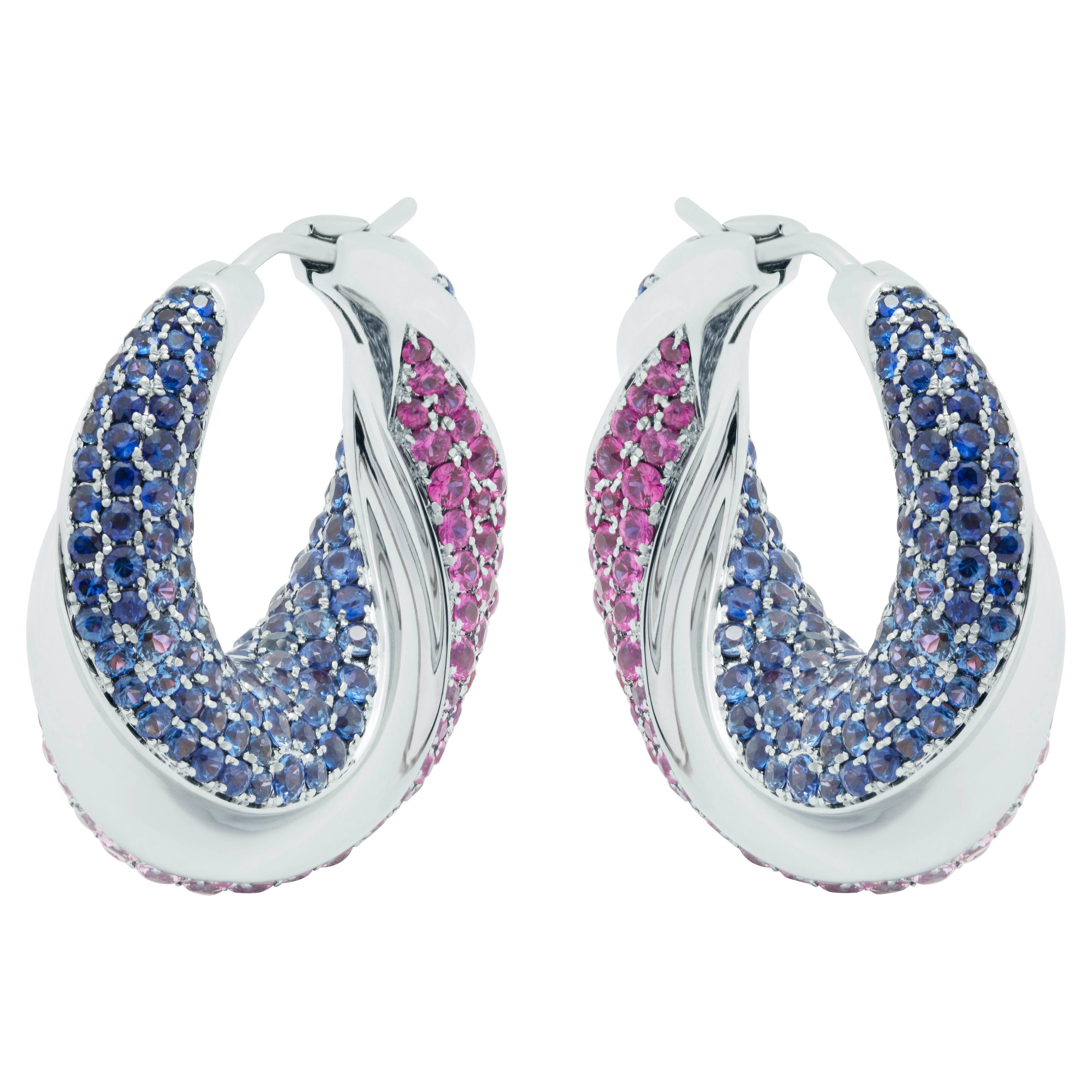 Pink and Blue Sapphires 18 Karat White Gold New Age Earrings
Look at this spectacular 196 Pink Sapphires weighing 3.96 Carat and 248 Blue Sapphires weighing 3.90 Carat combination. This gleaming ensemble creates a feeling of love and passion. White