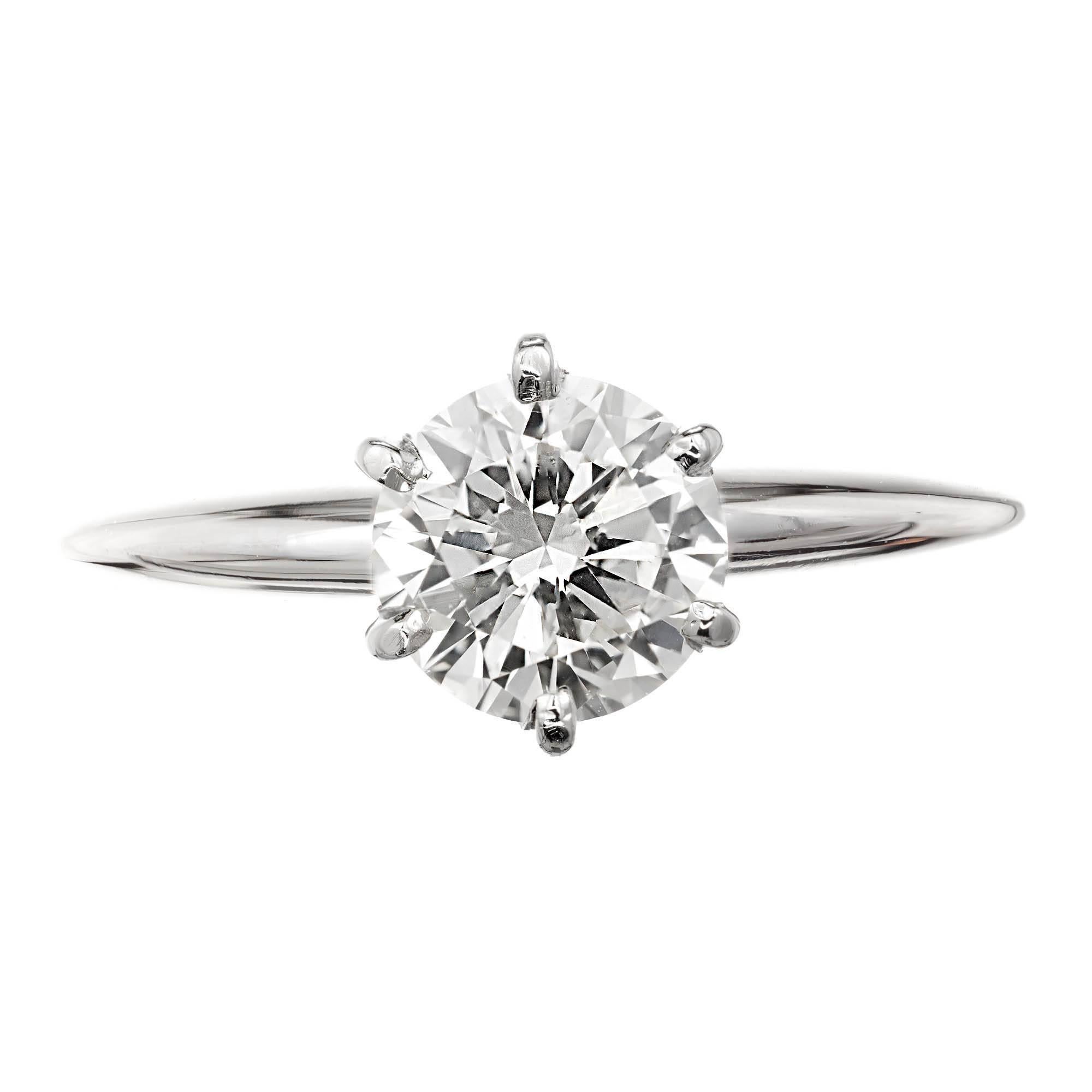 1.00ct Round Diamond 14k white gold solitaire engagement ring.  EGL certified Q-R, VS1


1.00 Ct Q-R color, VS1 clarity, Depth: 58%, Table 61% EGL certificate # US64065704D
Size 6.25 and sizable
Width at top: 8mm
Height at top: 7mm
Width at bottom: