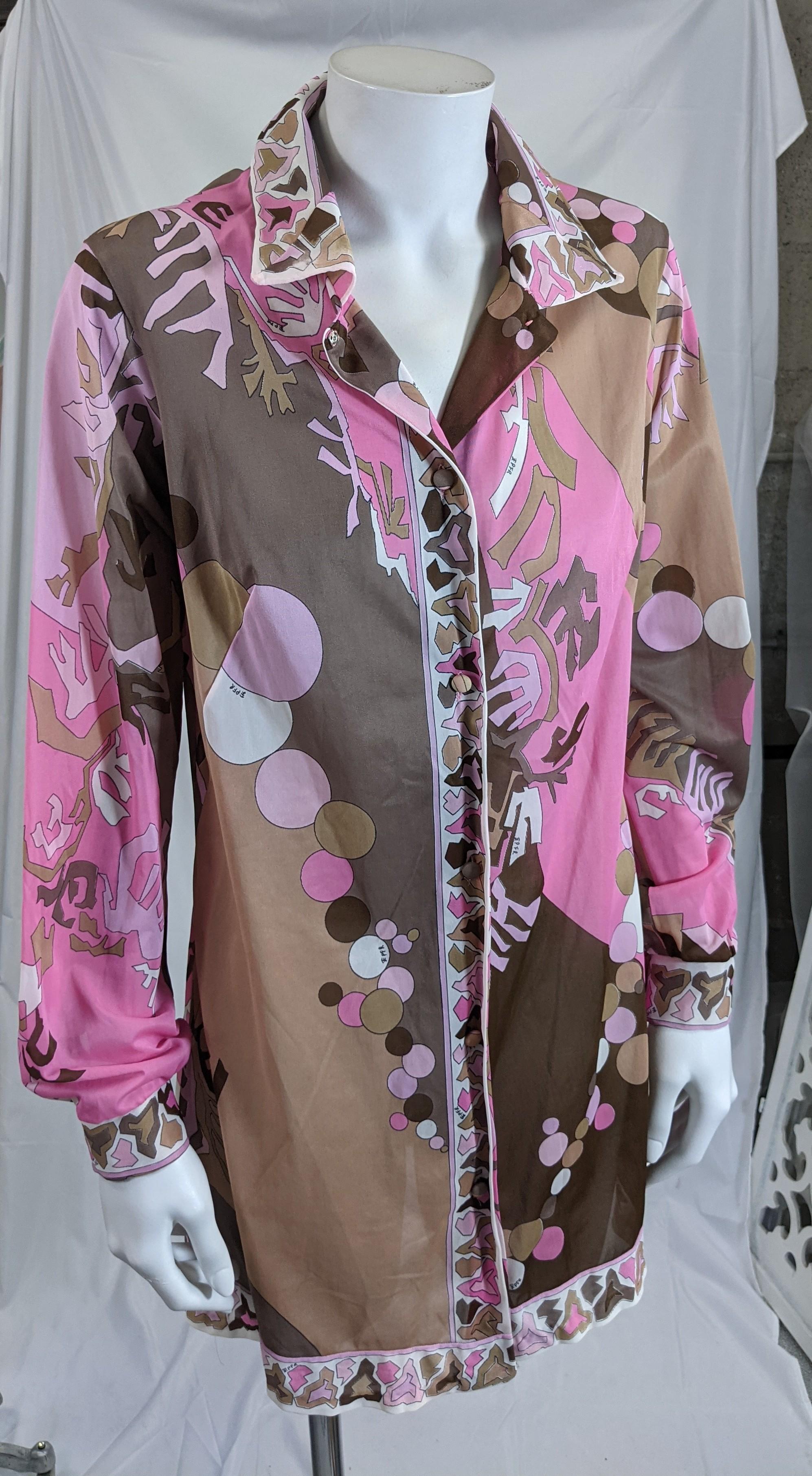 Pink and Brown Pucci light weight nylon jersey shirt dress for Formfit Rogers. Designed originally as loungewear for home wear, these versatile packable pieces are now worn as day and even evening wear. 
Shirt dress style with covered buttons