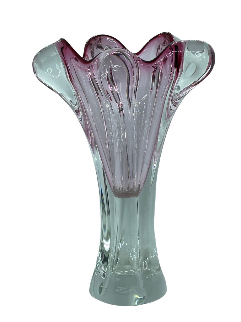 Beautiful Murano hand blown Italian art glass vase. Created by a Murano glass company. A beautiful piece of art for any room. Imperfection in the glass at the base please see pictures. Probably could be fixed by a glass grinder near you.